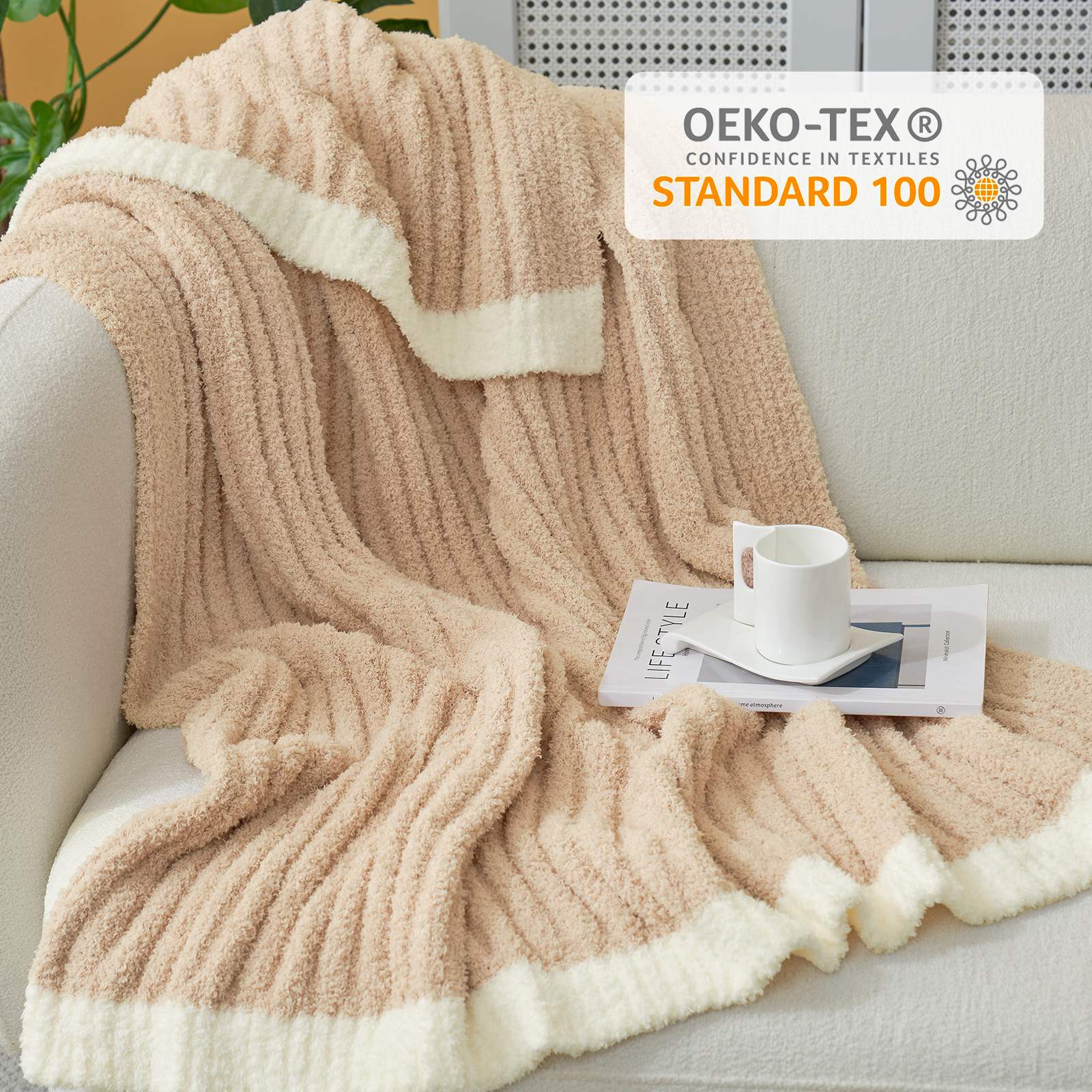 Snuggle Sac UltraSoft Ribbed Feather Yarn Knit Throw Blanket draped on the couch with OEKO-TEX Certificate#Color_Beige