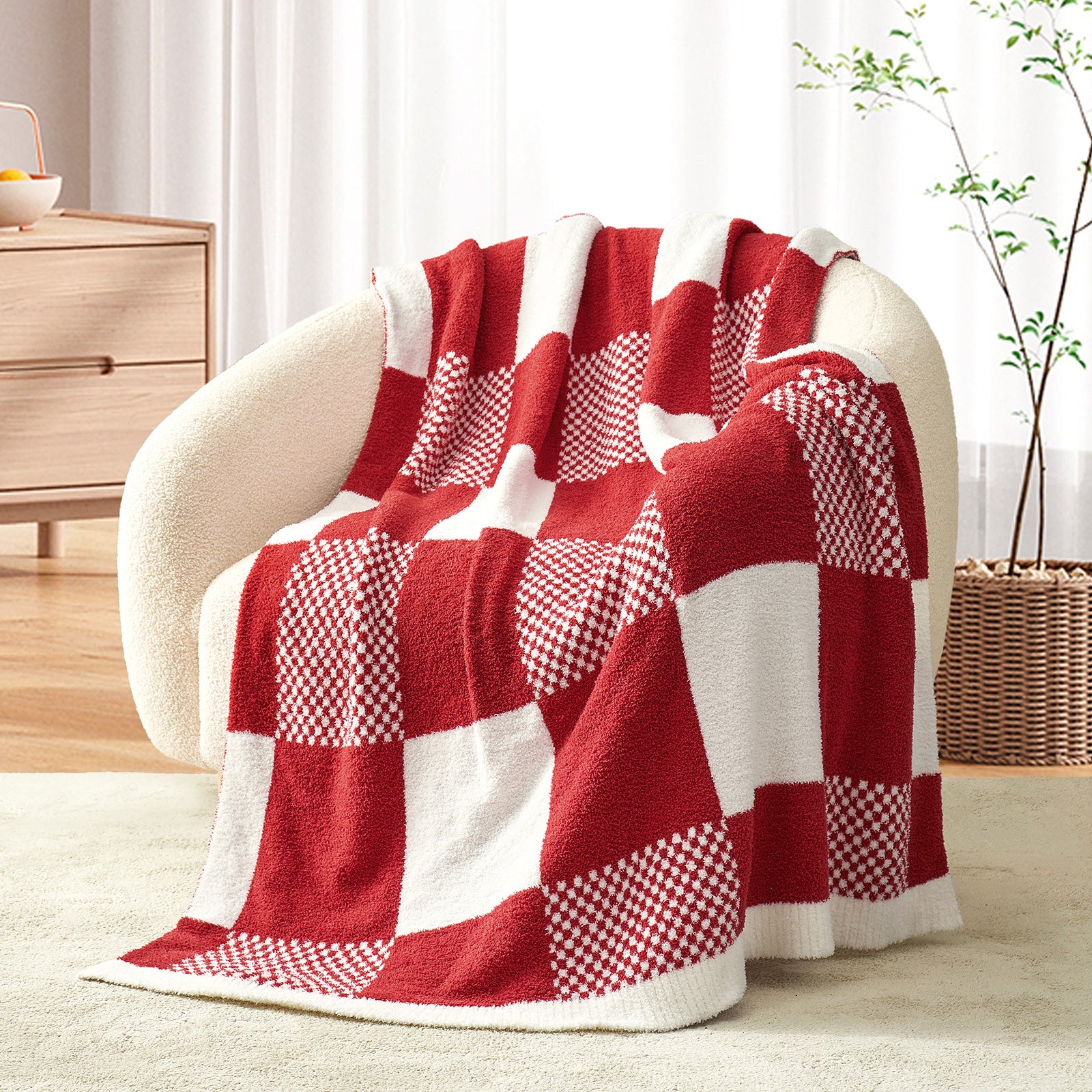 Snuggle Sacs Checkered Feather Yarn Knit Throw Blanket on the chair with furnitures behind#color_Red White