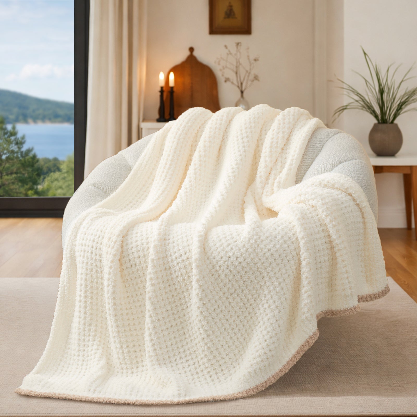 Soft Waffle Feather Yarn Knit Throw Blanket on a beige couch with window and plants behind #Color_Cream