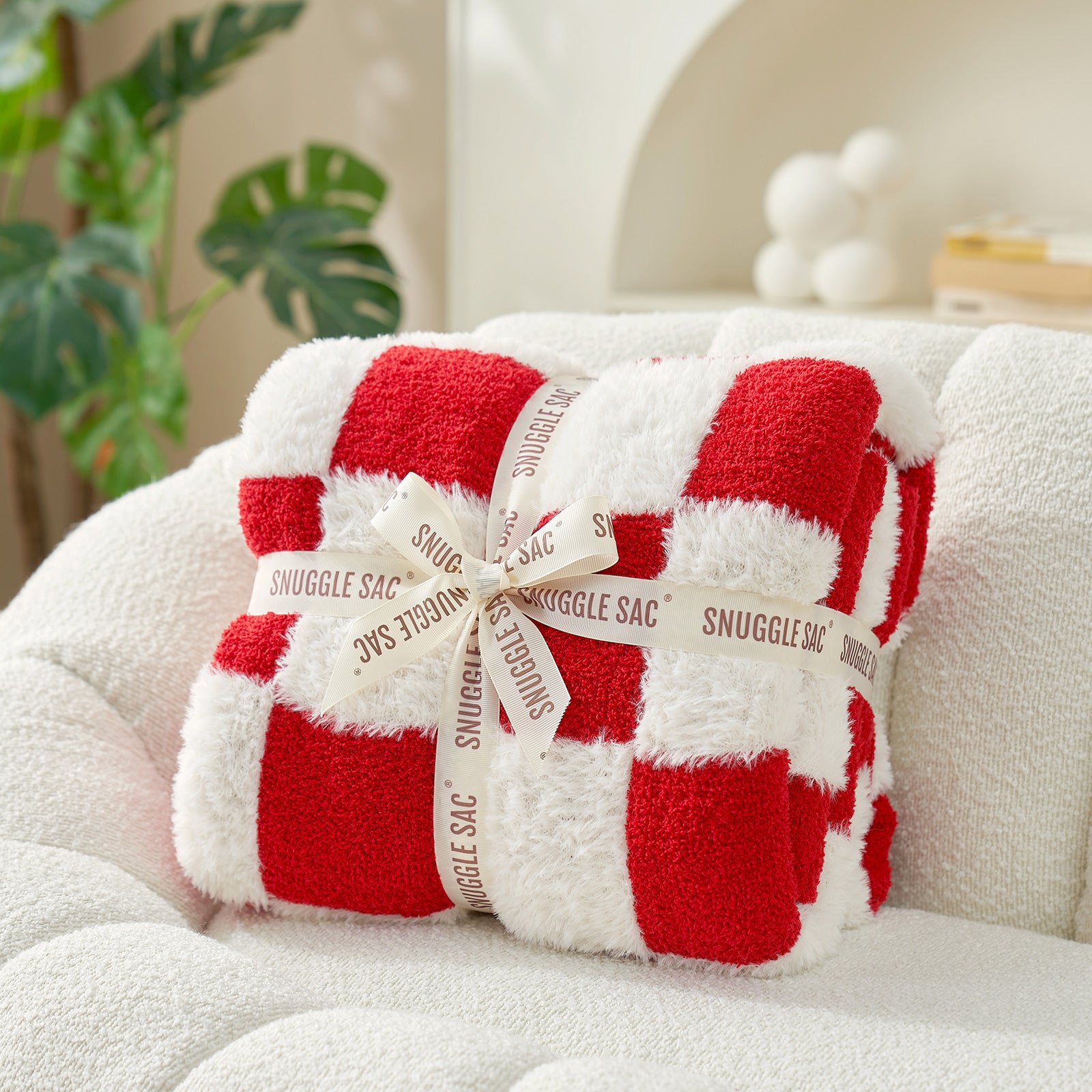 UltraCozy Checkered Feather Yarn Knit Throw Blanket wrapped as a gift#Color_Red/Cream
