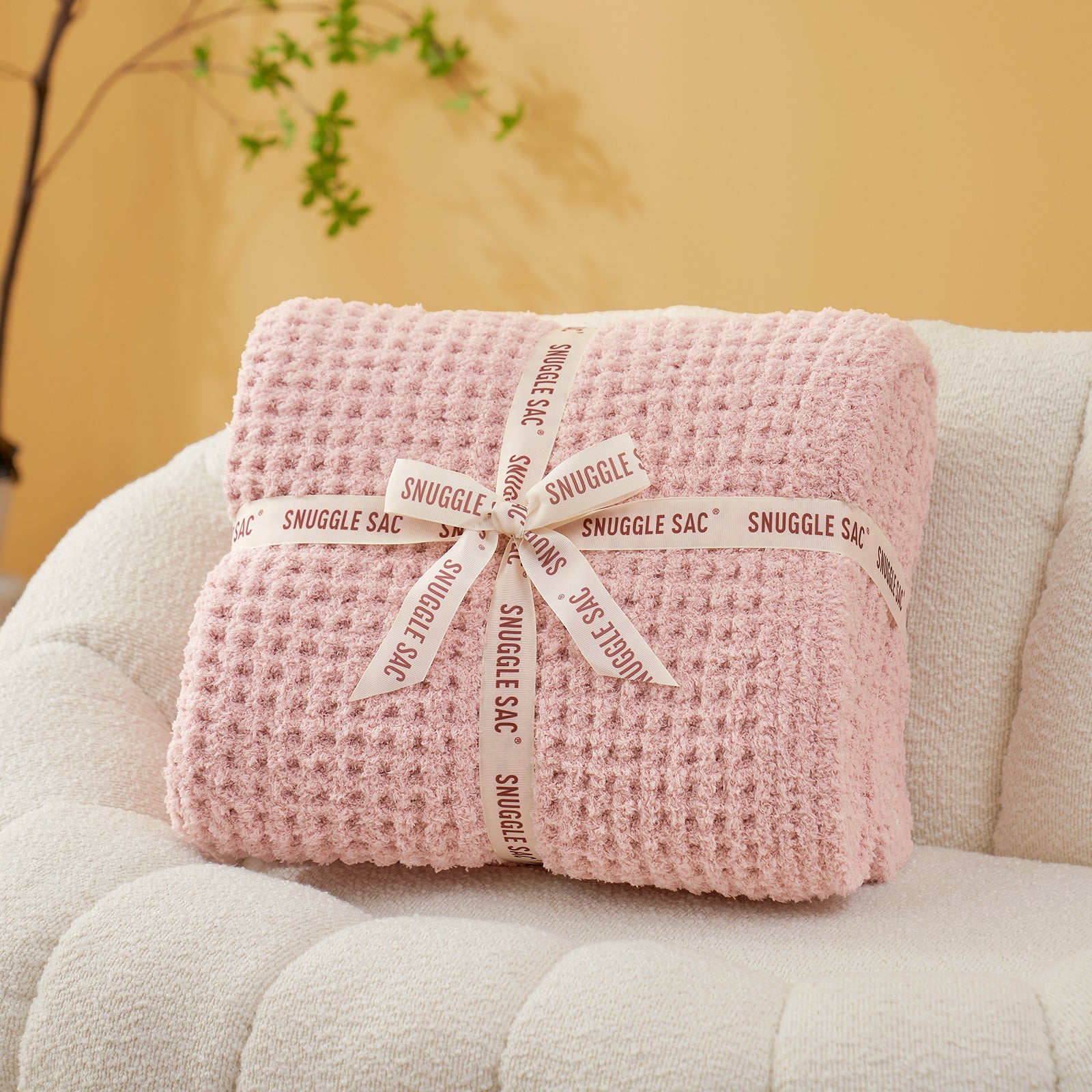 Soft Waffle Feather Yarn Knit Throw Blanket wrapped as a perfect gift with ribbon#Color_Pink