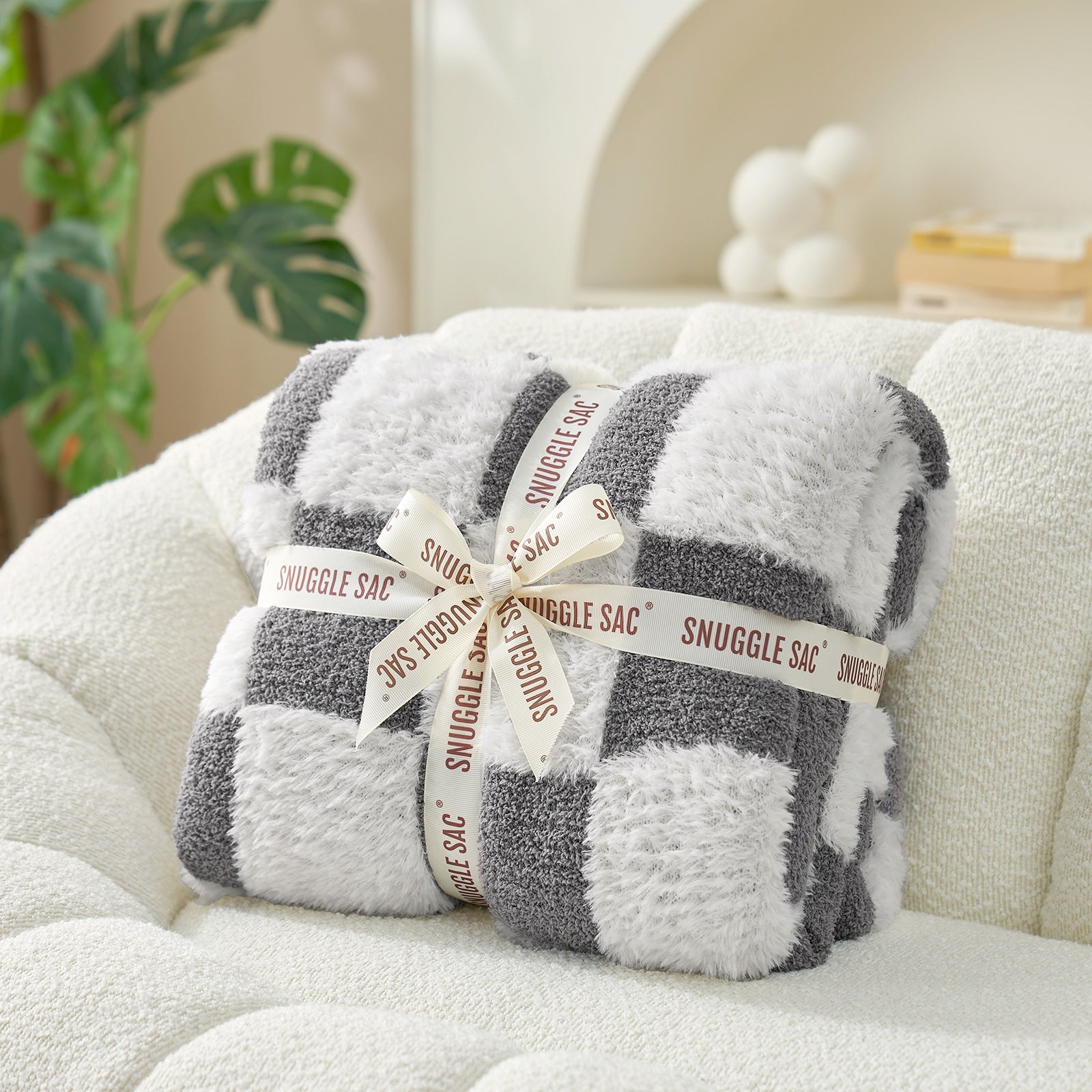 UltraCozy Checkered Feather Yarn Knit Throw Blanket wrapped as a gift#Color_Grey White