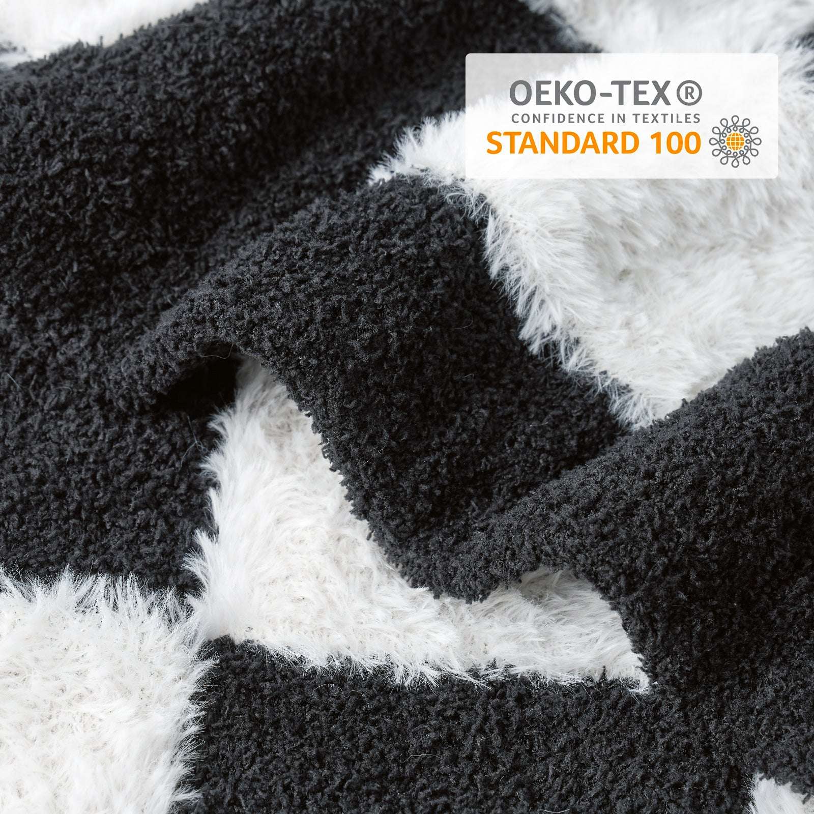 Close up of UltraCozy Checkered Feather Yarn Knit Throw Blanket with OEKO-TEX Certificate#Color_Black White