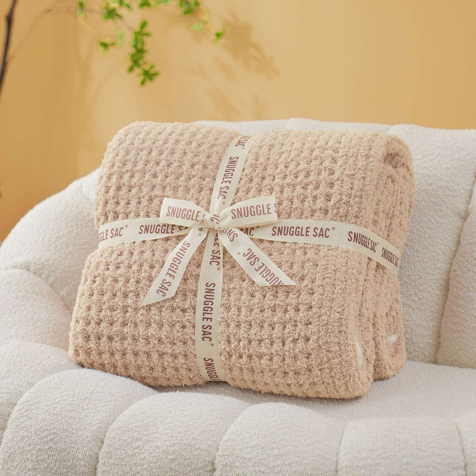 Soft Waffle Feather Yarn Knit Throw Blanket wrapped as a perfect gift with ribbon#Color_Beige