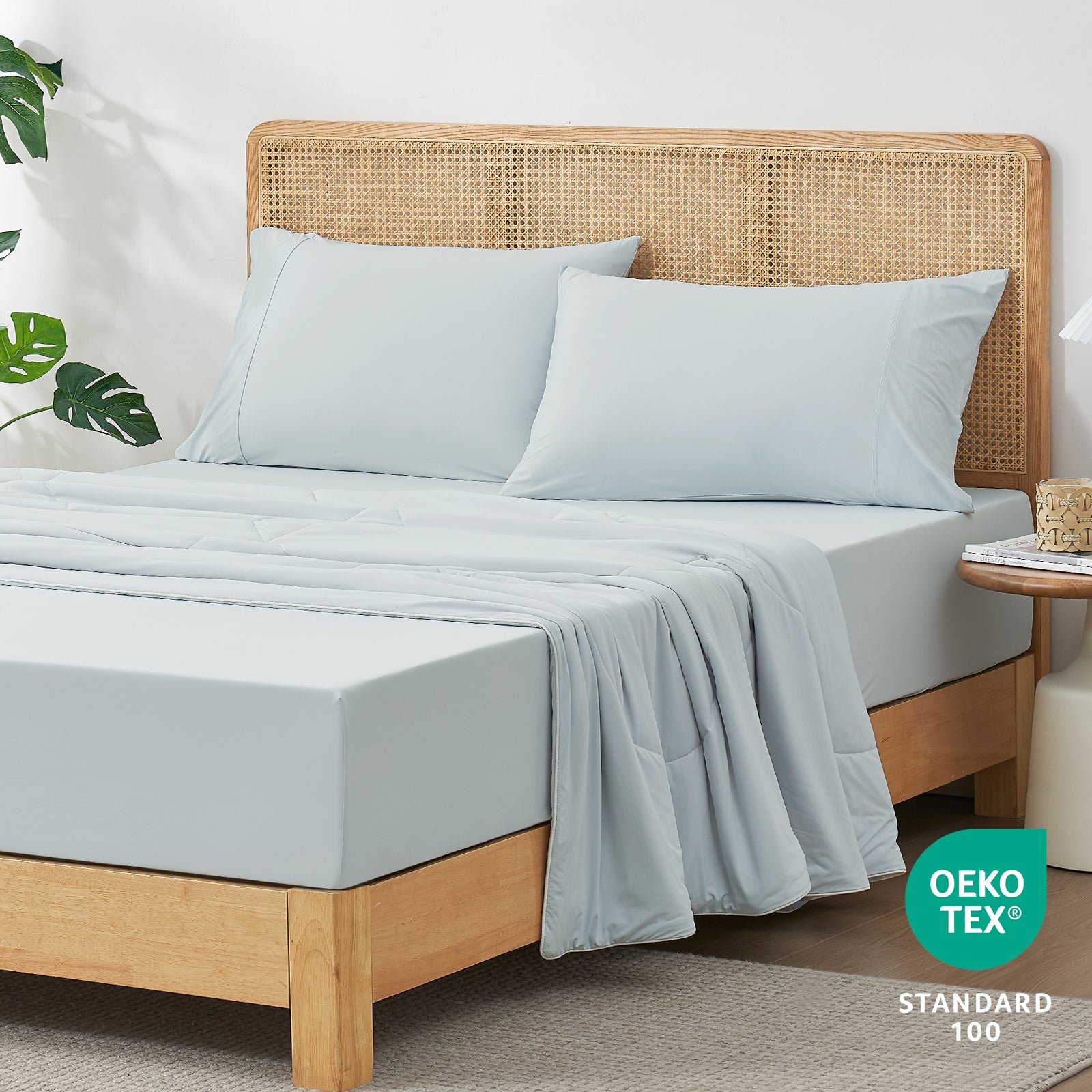 45-degree bedroom view with OEKO-TEX certified Snuggle Sac fitted sheet.#color_Blue
