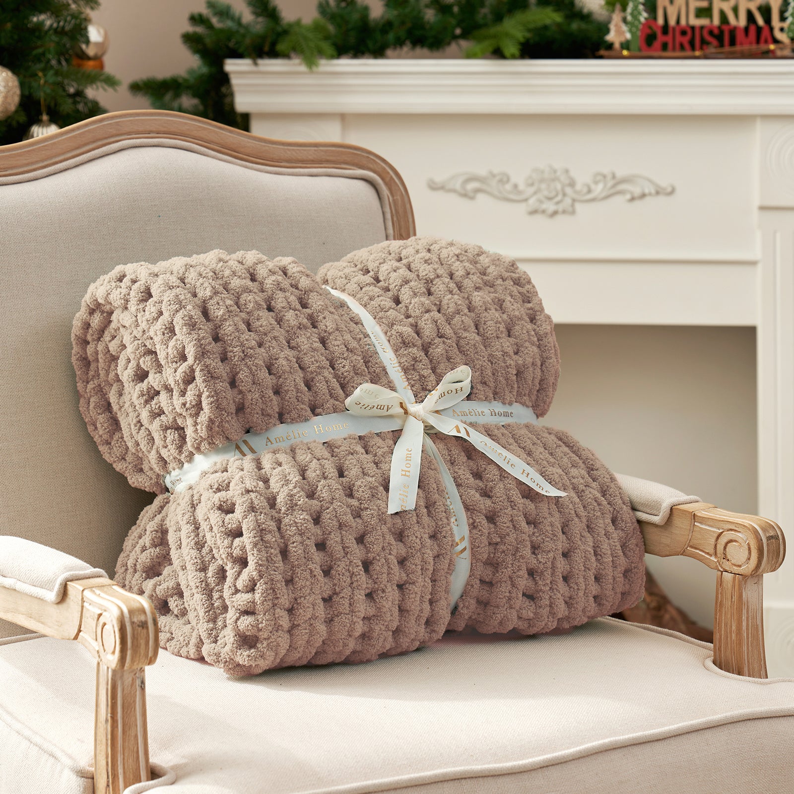 Rolled chunky knit throw blanket in Beige with ribbon showcasing plush texture #color_Beige