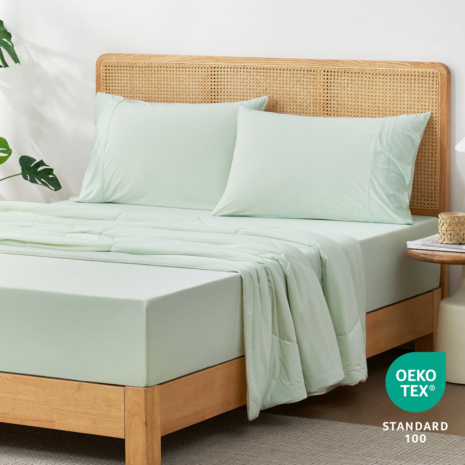 45-degree bedroom view with OEKO-TEX certified Snuggle Sac fitted sheet.#color_Mint Green