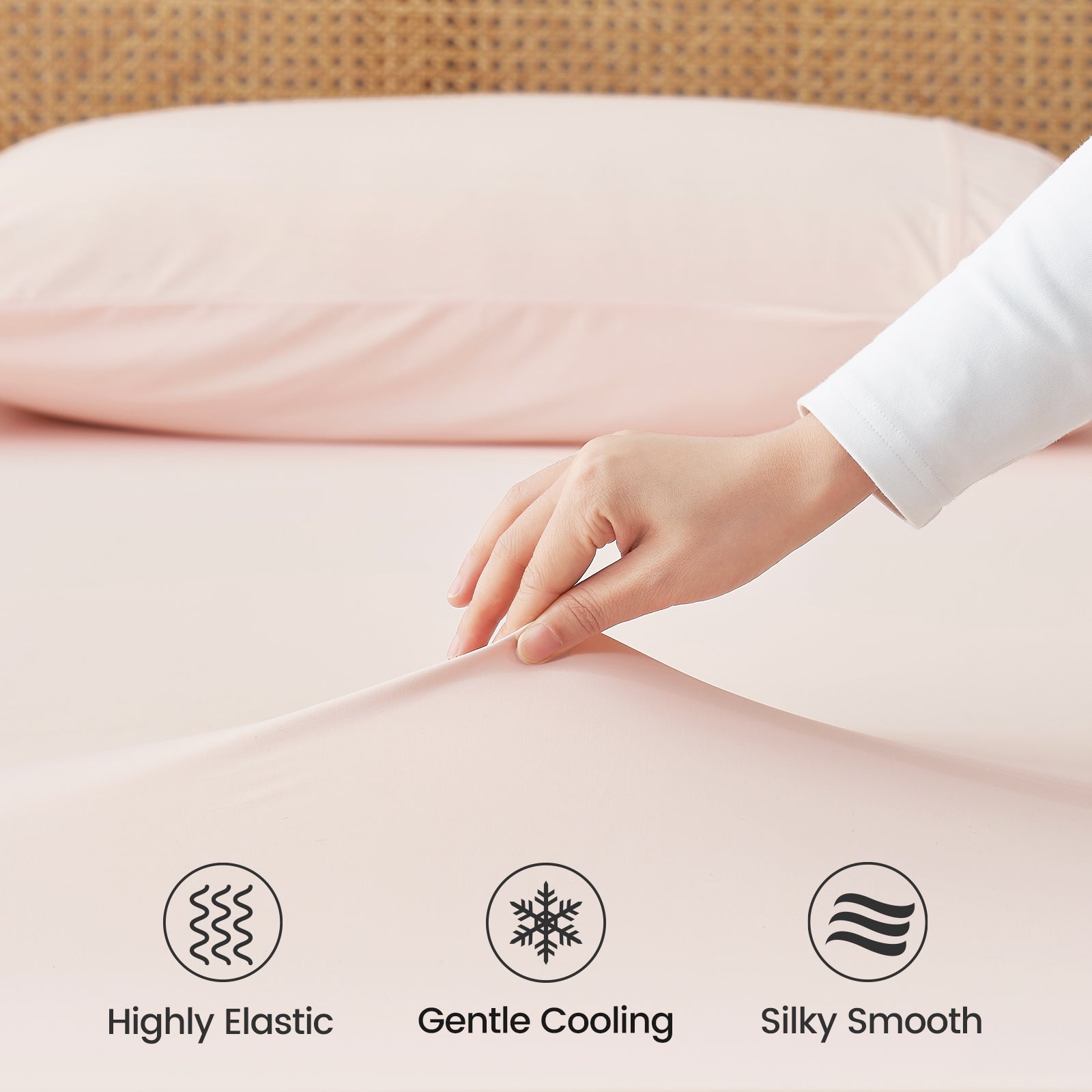 Close up of Snuggle Sac cooling fabric labeled 'Highly Elastic', 'Gentle Cooling', and 'Silky Smooth'.#color_Pink