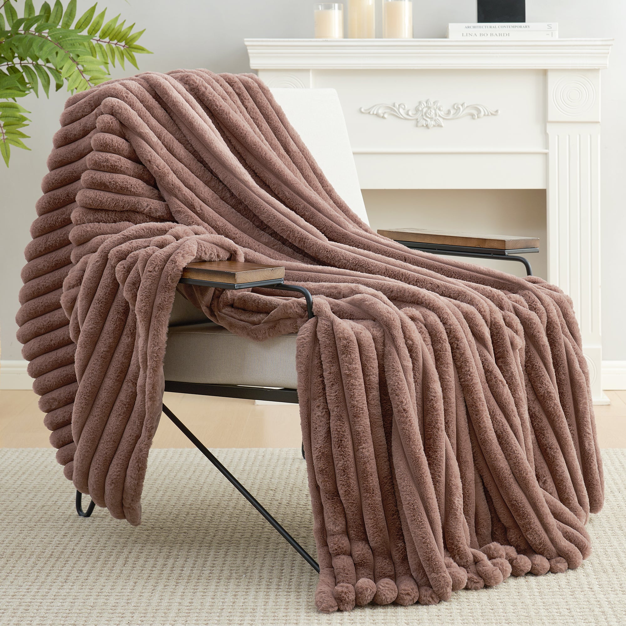 Snuggle Sac striped faux fur throw blanket in Light coffee draped over a chair, creating a warm and inviting atmosphere #color_Light coffee