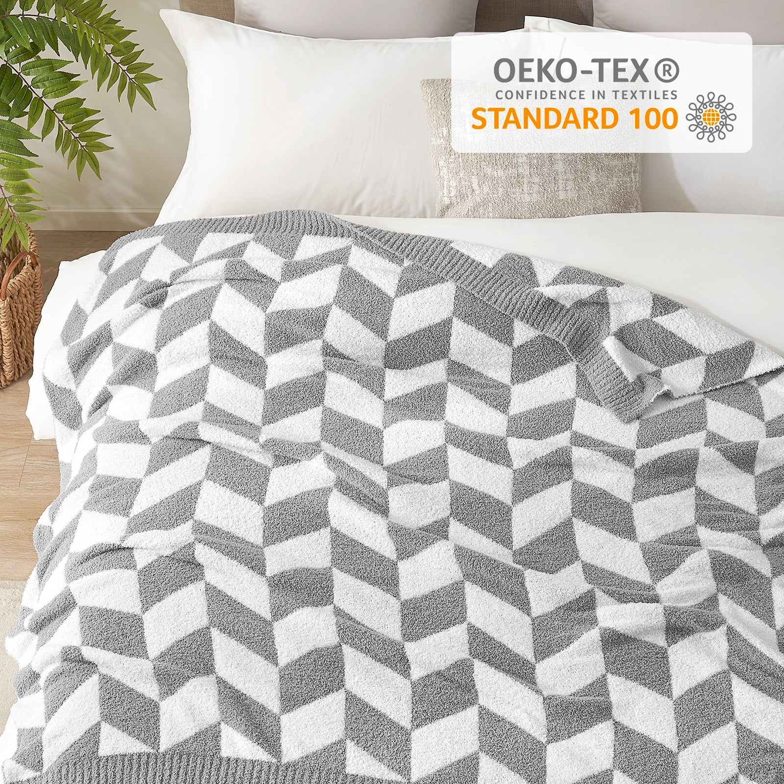 Close up of Snuggle Sacs Chevron Feather Yarn Knit Throw Blanket with OEKO-TEX Certificate#color_Grey