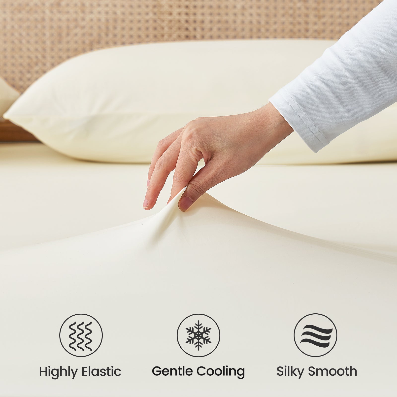 Close up of cooling fabric labeled 'Highly Elastic', 'Gentle Cooling', and 'Silky Smooth'.#color_Wite