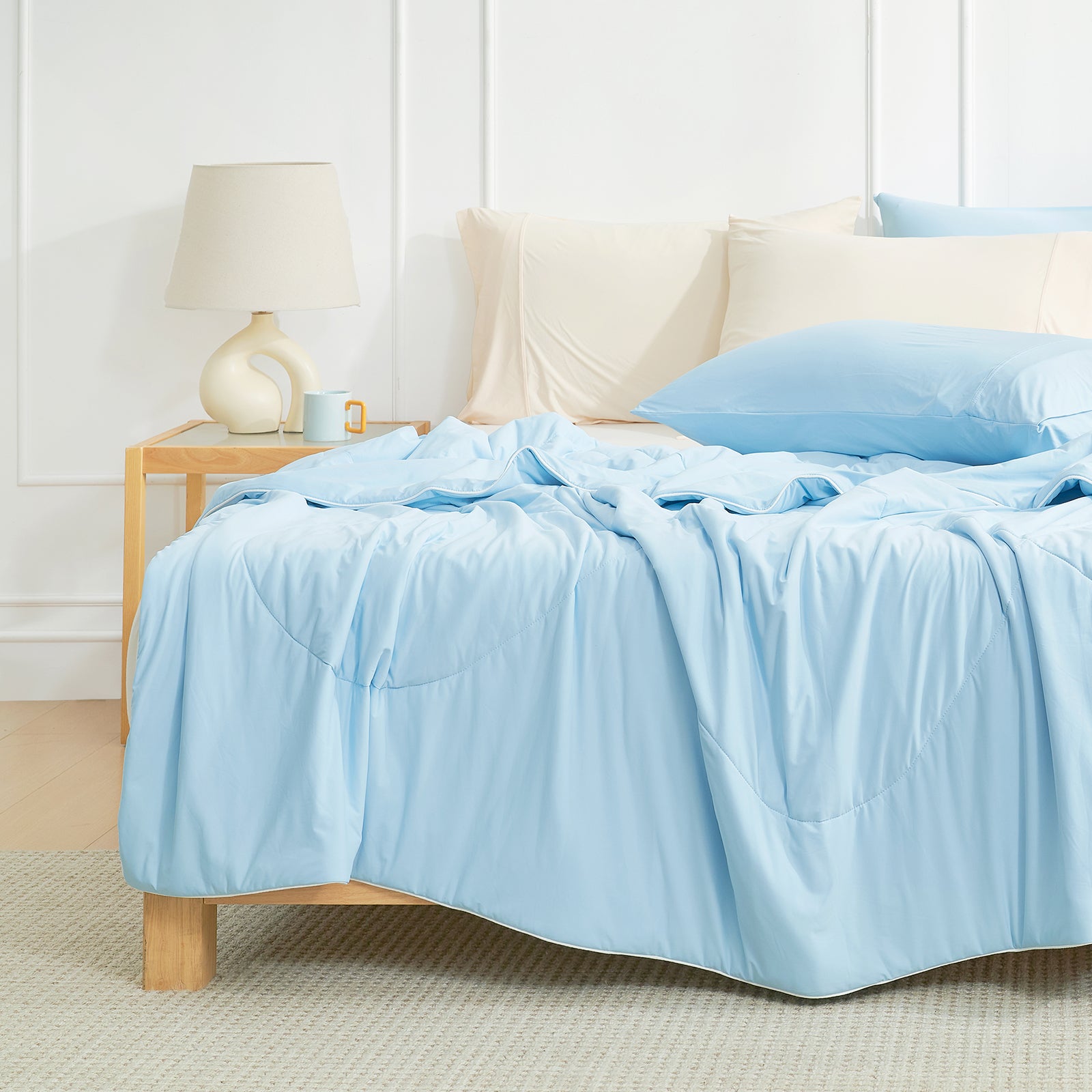 Bed with Snuggle Sac blue bedding in a bright bedroom setting#color_Sky Blue
