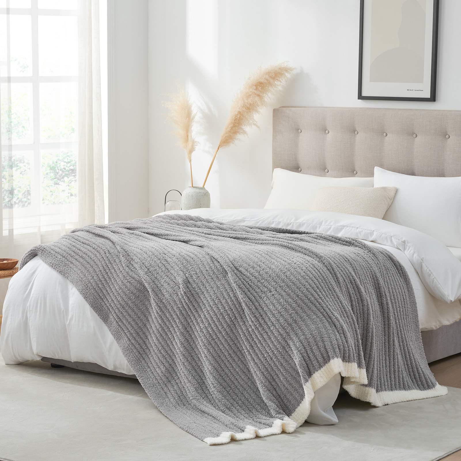 Snuggle Sac UltraSoft Ribbed Feather Yarn Knit Throw Blanket on the bed with furnitures#Color_Grey