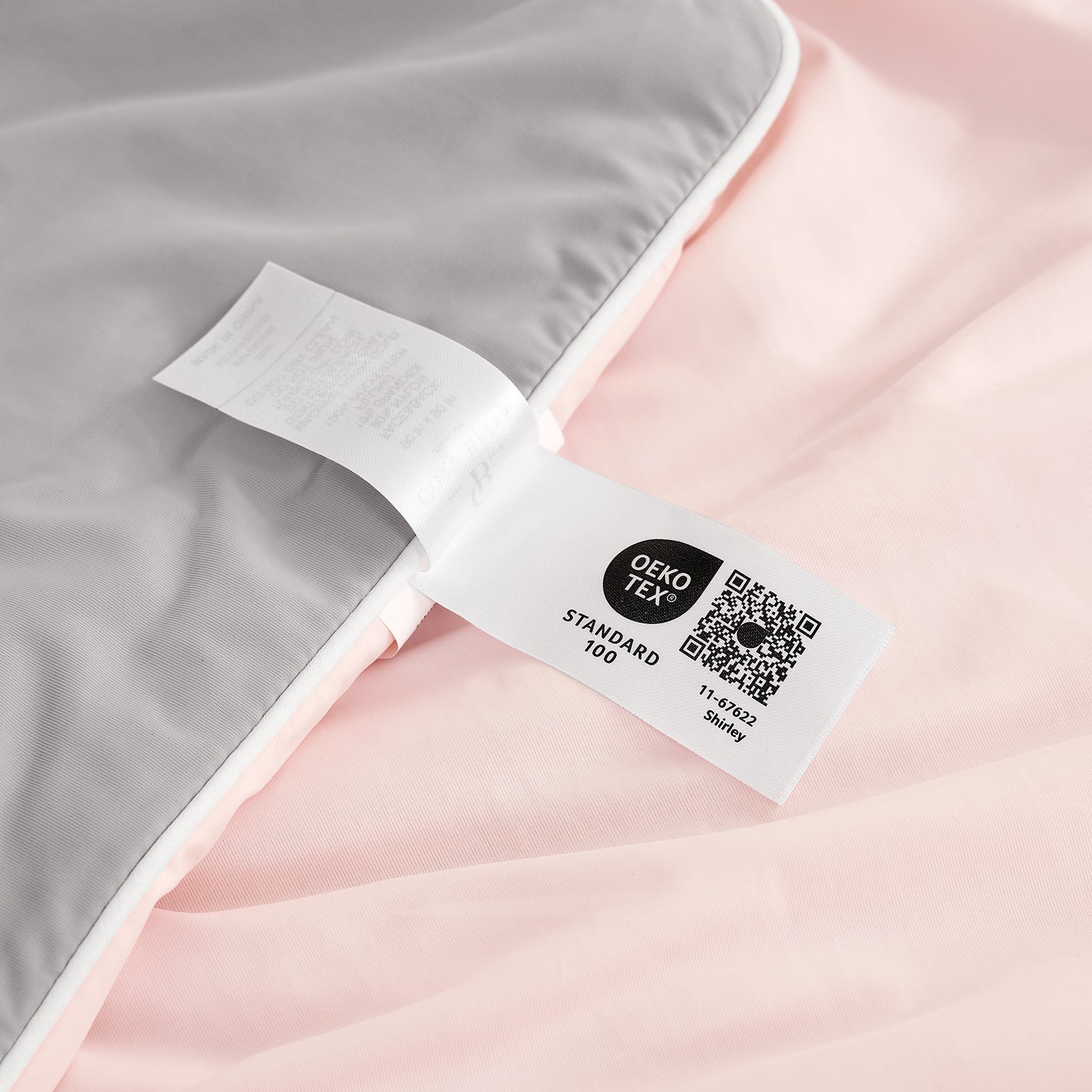 Close up of OEKO-TEX certified cooling fabric#color_Pink/Grey