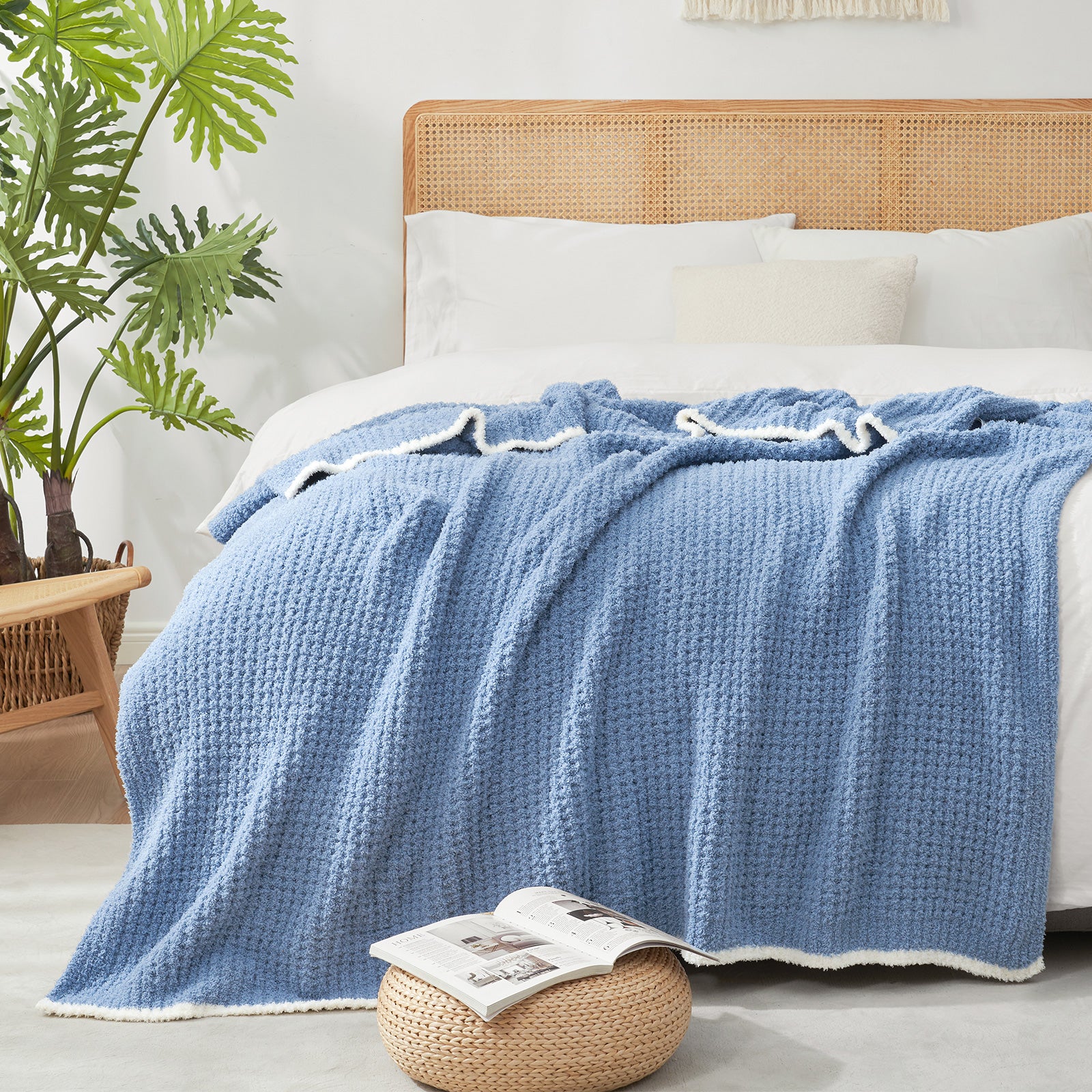 Soft Waffle Feather Yarn Knit Throw Blanket on a the bed in a bright room with vase of plant and magazine#Color_Blue