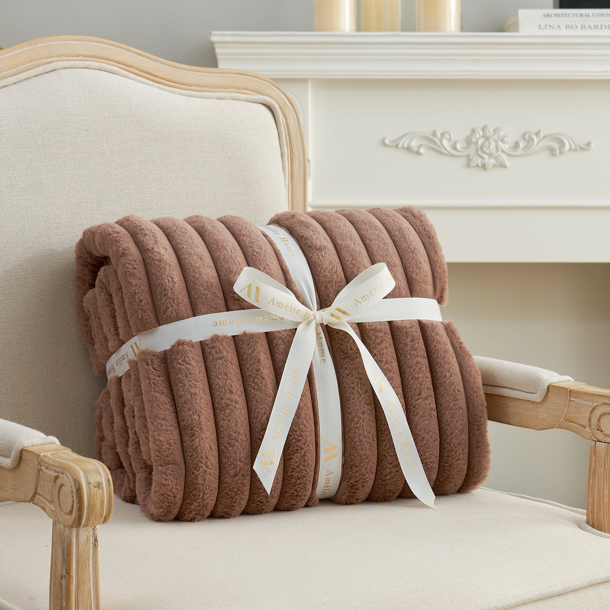 Striped faux fur throw blanket in Light coffee folded with ribbon, perfect for gifting #color_Light coffee