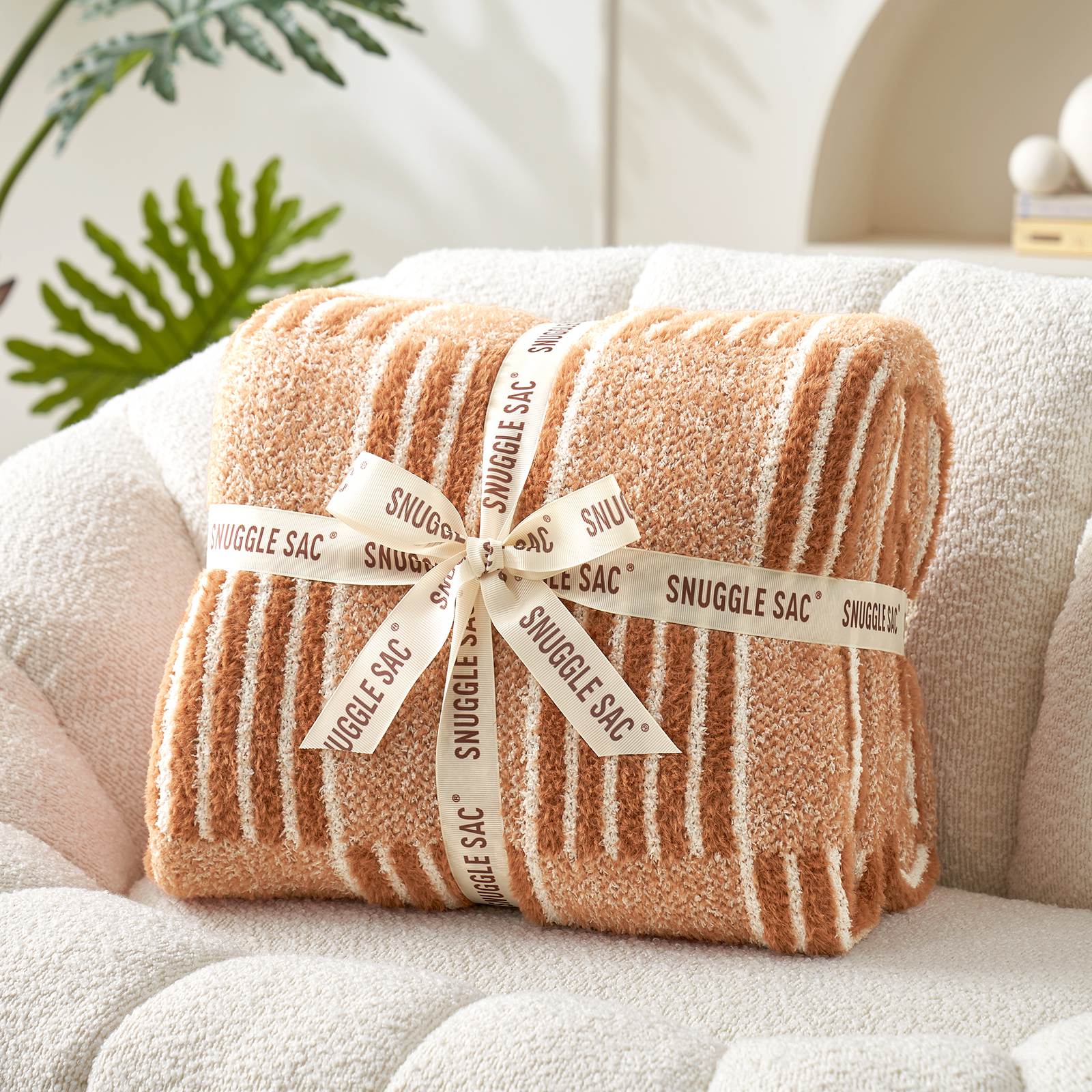 Snuggle Sacs Reversible Heather Checkered Feather Yarn Knit Throw Blanket wrapped as a pefect gift with ribbon#Color_Heather Orange