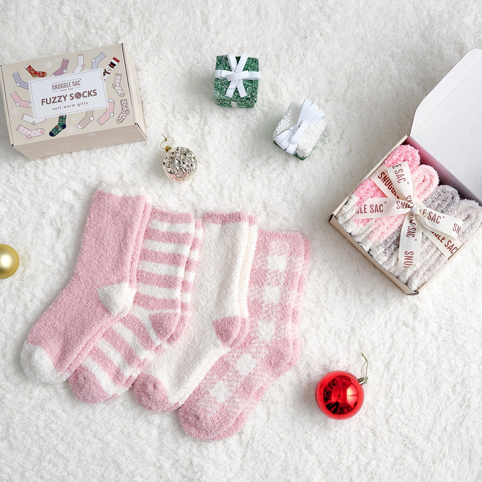 Snuggle Sac women checkered and striped socks 4 pairs in Pink displayed in a cozy holiday gift setting #color_Pink
