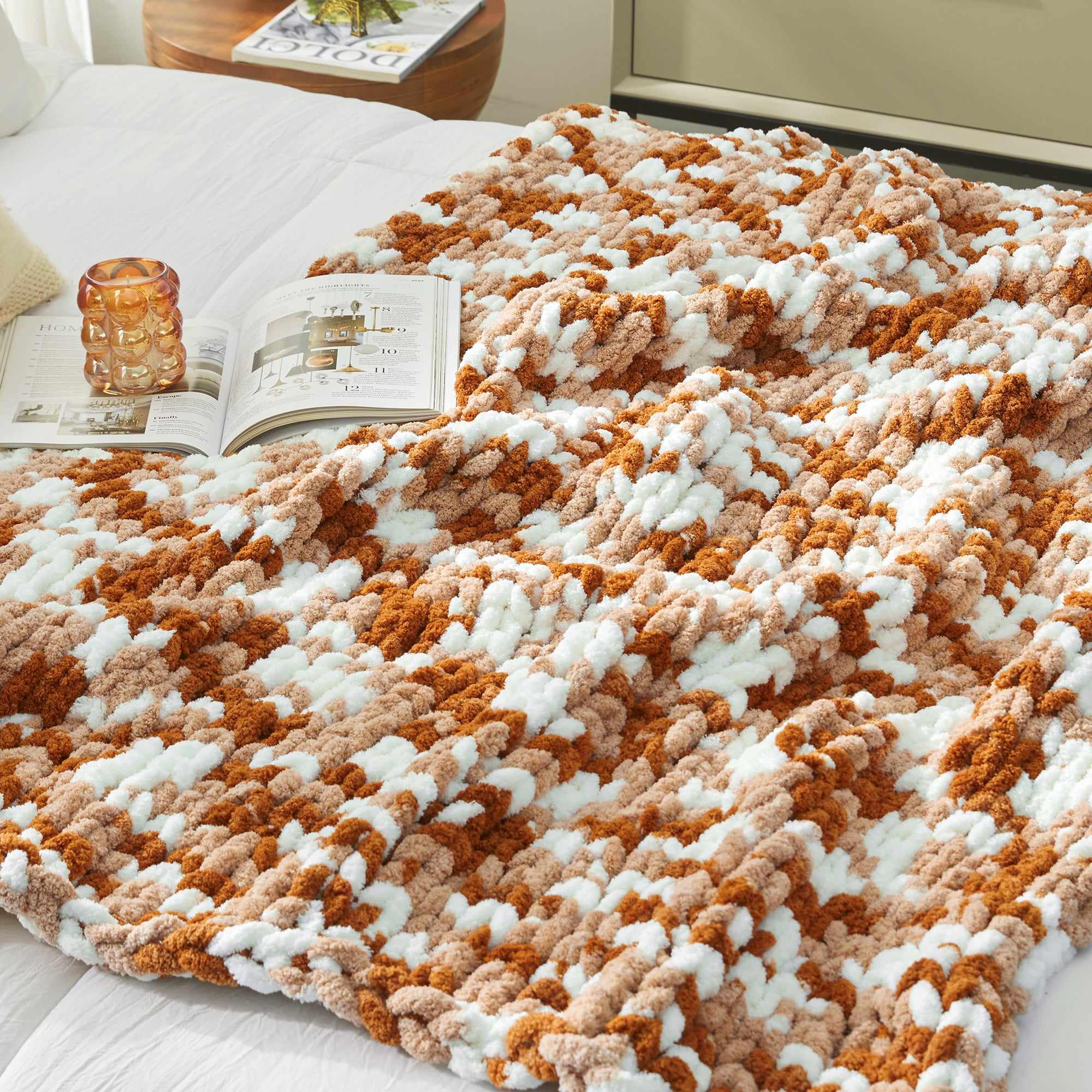 Close up of chunky chenille knit throw blanket in Burnt Orange laid flat showcasing plush texture #color_Burnt Orange