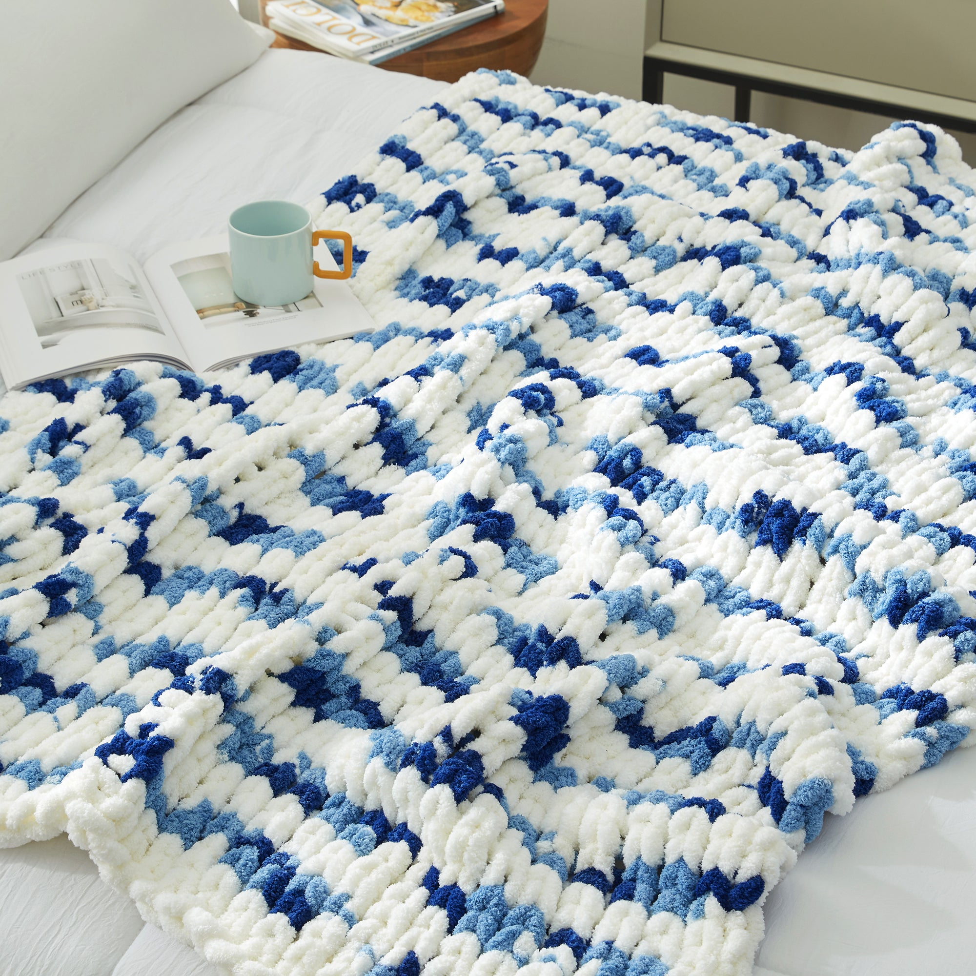 Close up of chunky chenille knit throw blanket in Blue Stripe laid flat showcasing plush texture #color_Blue Stripe