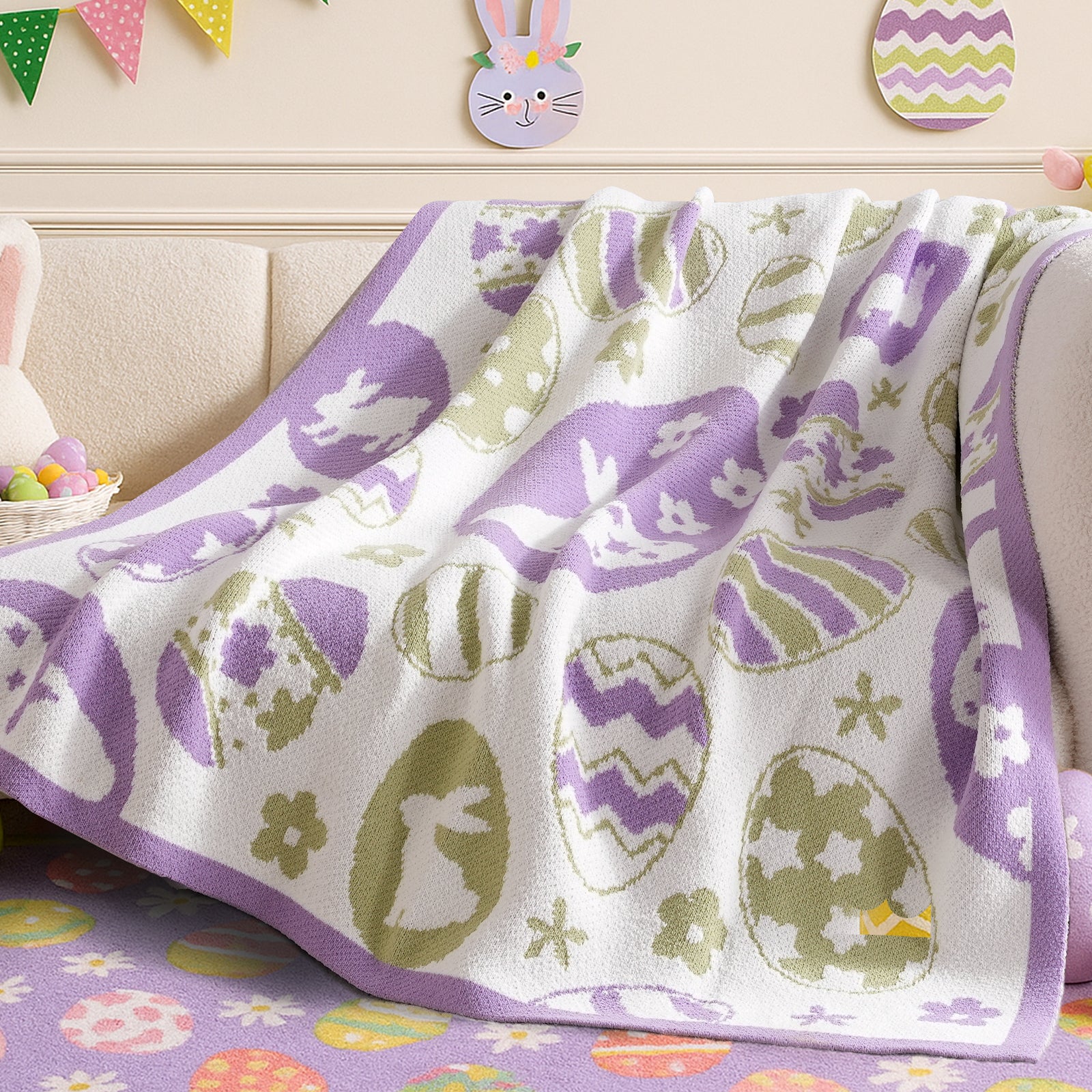 Festive bunny and egg patterned knit throw blanket in purple styled on a sofa for Easter decor #color_Purple