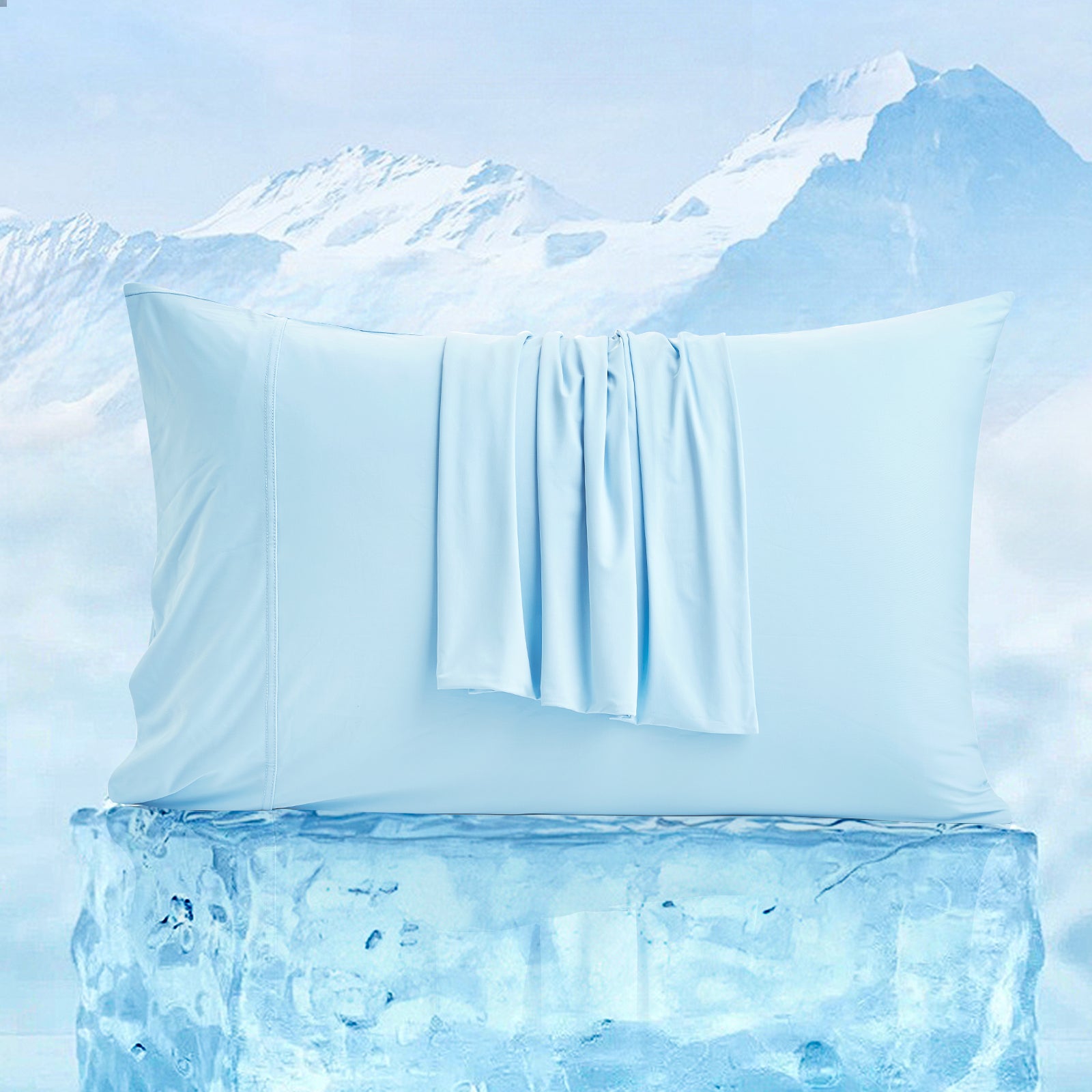 Snuggle Sac Pillowcases on a block of ice with a mountainous background,showing its cooling function.#Color_Sky Blue