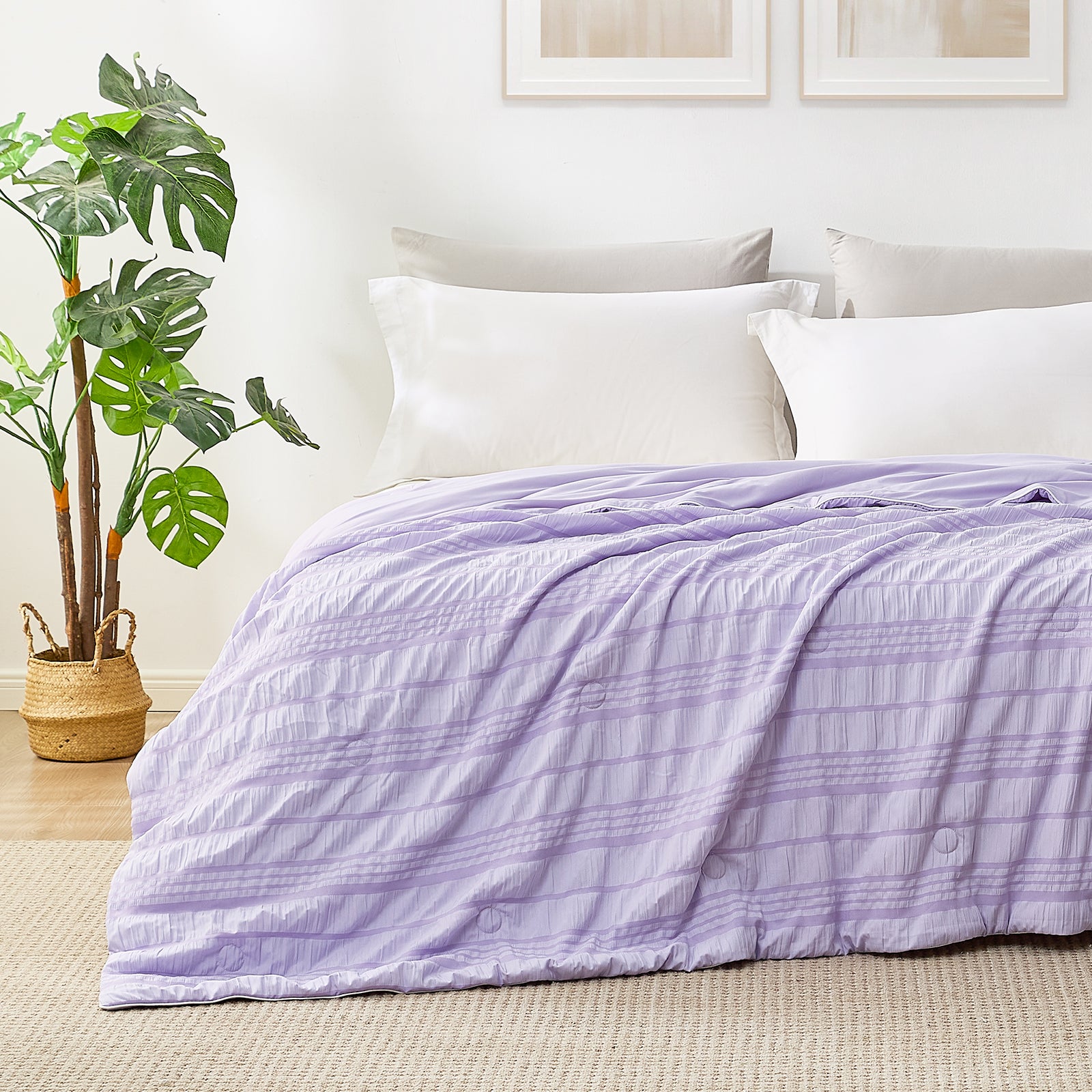 Snuggle Sac Cooling comforter in purple on bed in a bedroom with plants#color_Purple