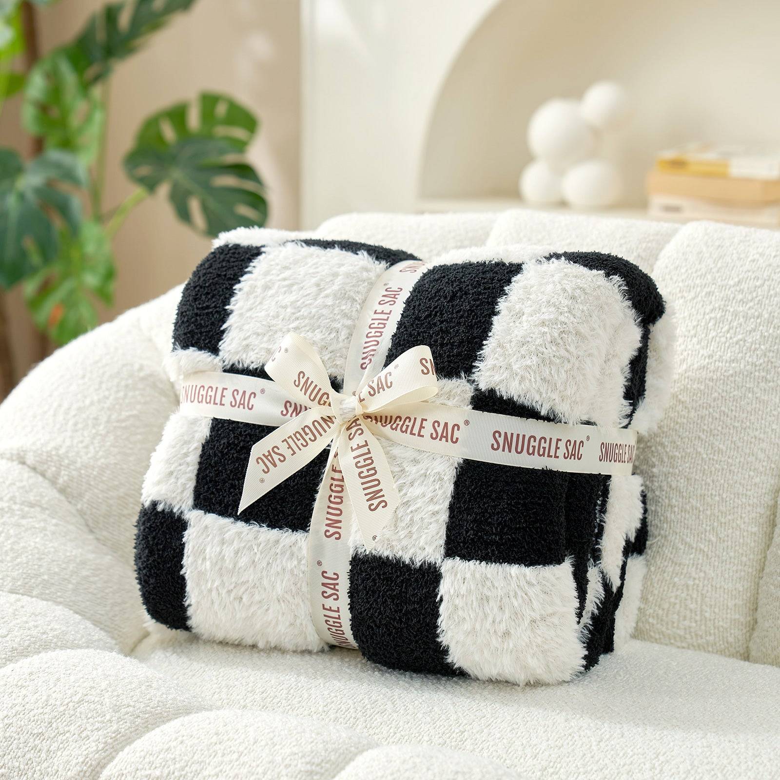 UltraCozy Checkered Feather Yarn Knit Throw Blanket wrapped as a gift#Color_Black White