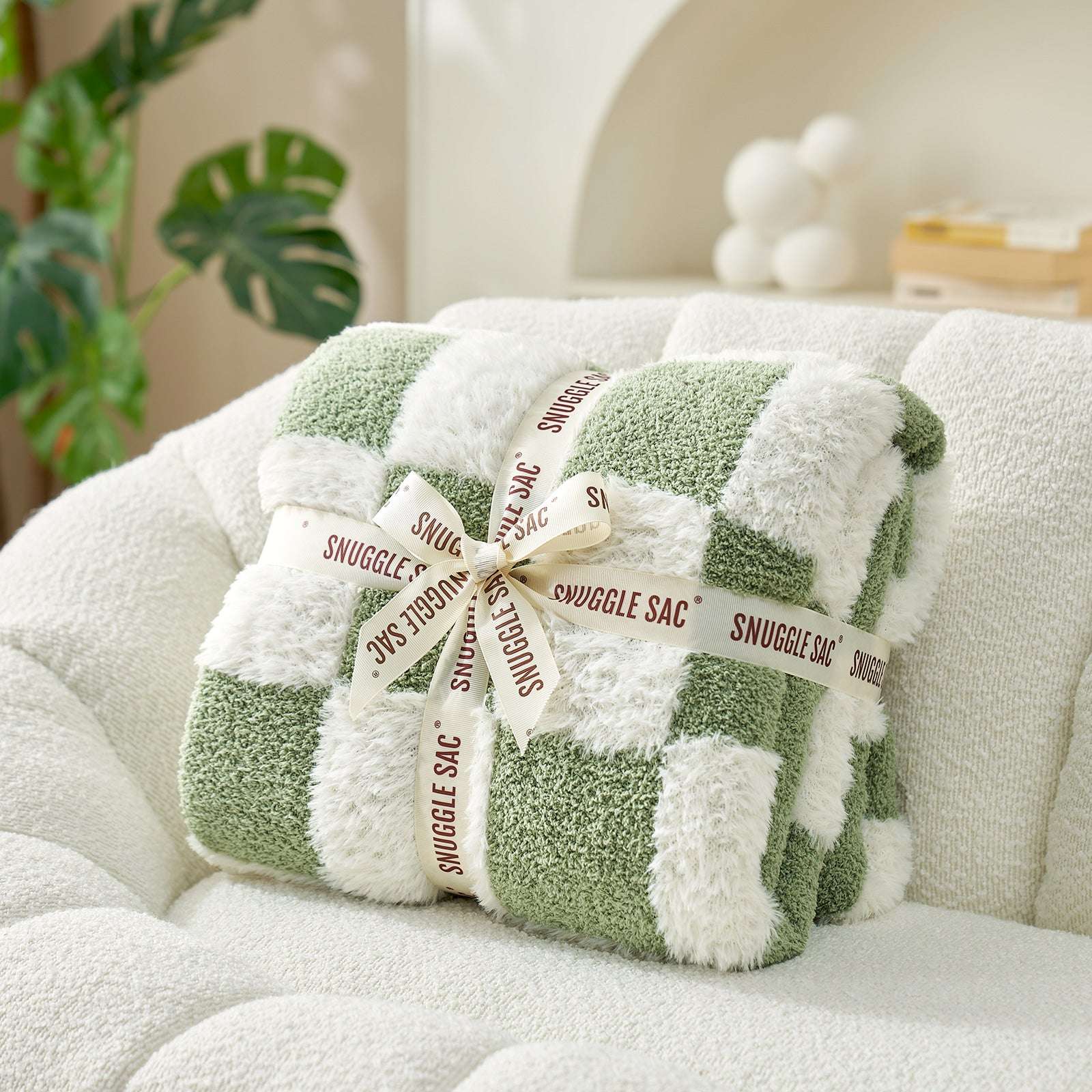 UltraCozy Checkered Feather Yarn Knit Throw Blanket wrapped as a gift#Color_Sage Green White