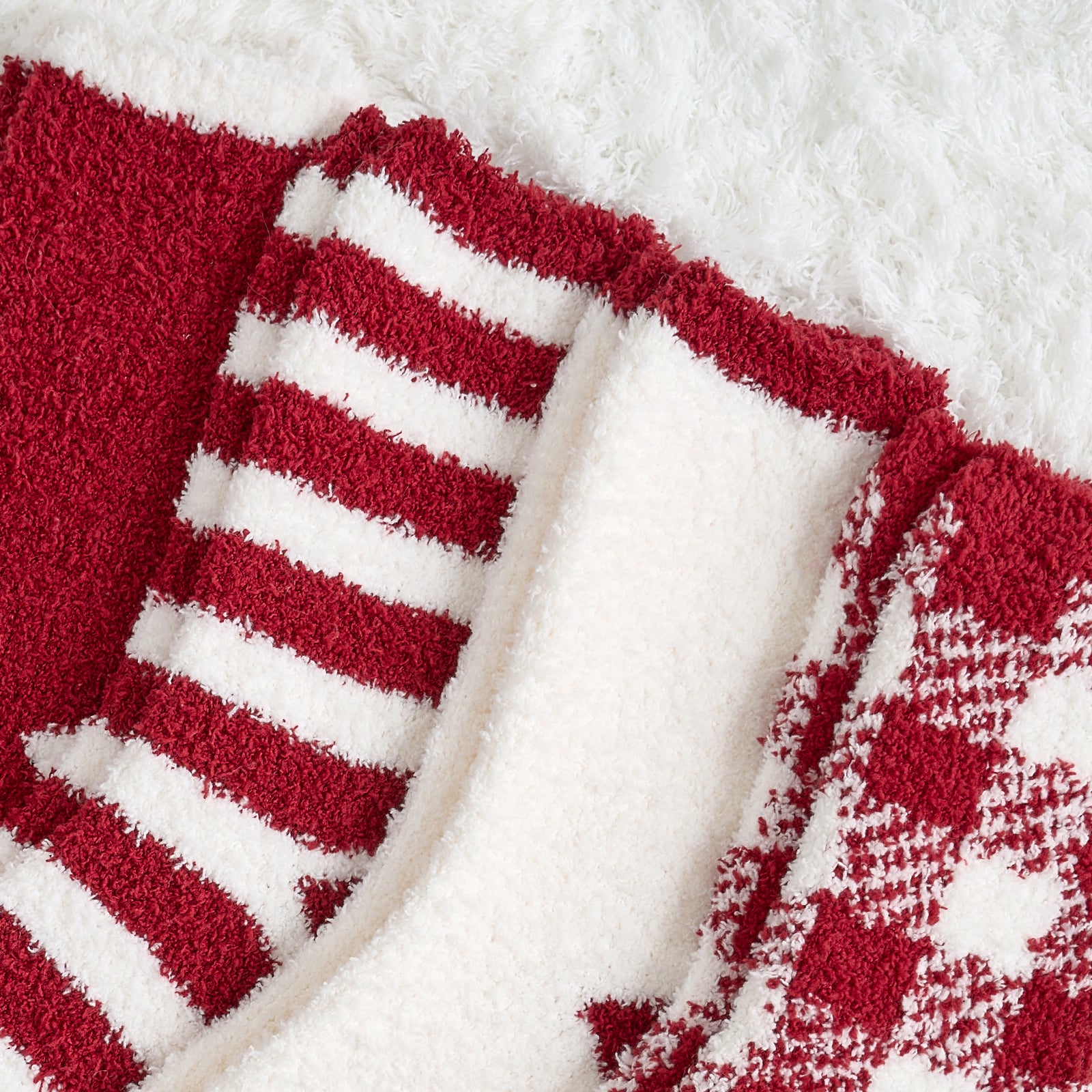 Close up of women checkered and striped socks 4 pairs in Red, highlighting striped and checkered plush design #color_Red
