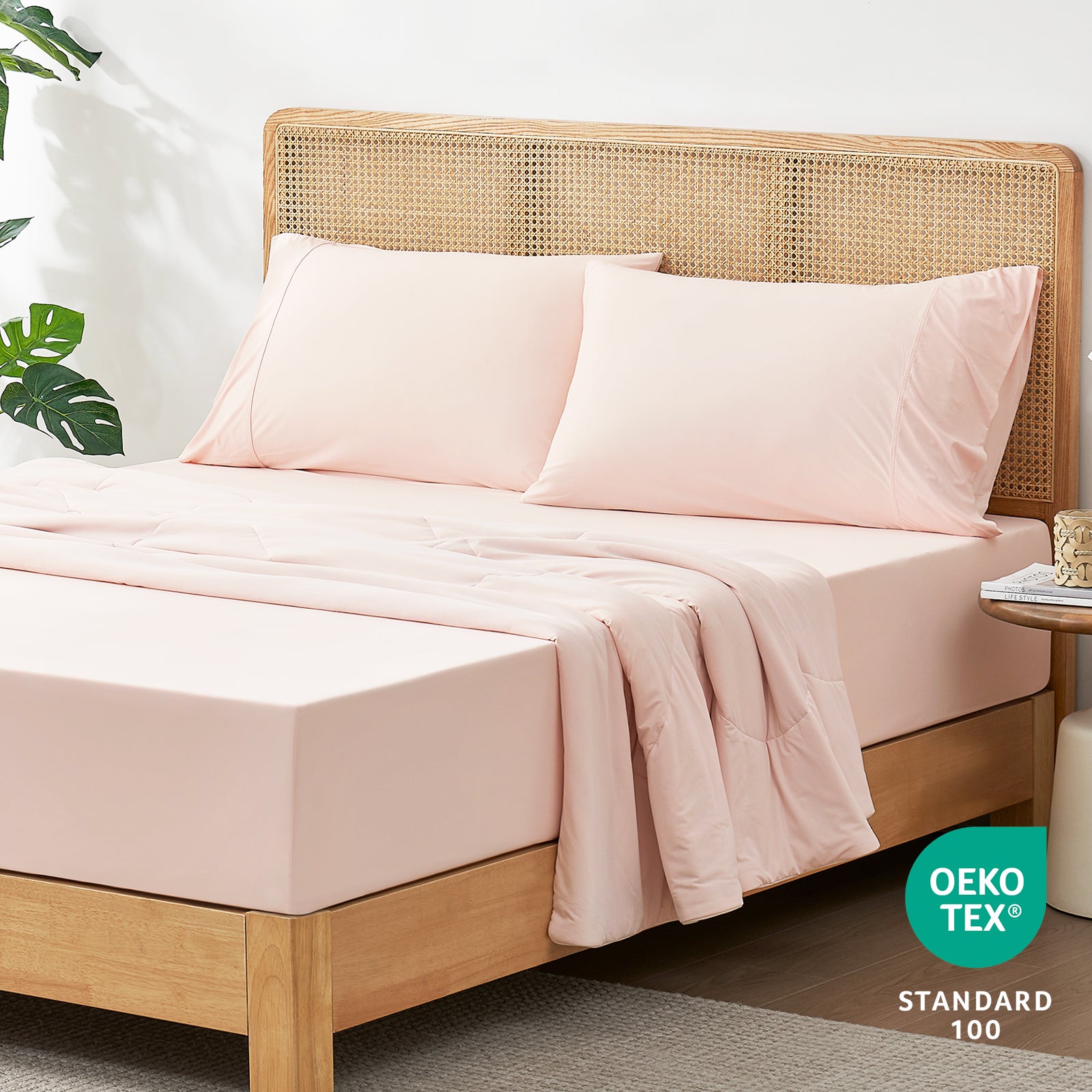 45-degree bedroom view with OEKO-TEX certified Snuggle Sac fitted sheet.#color_Pink