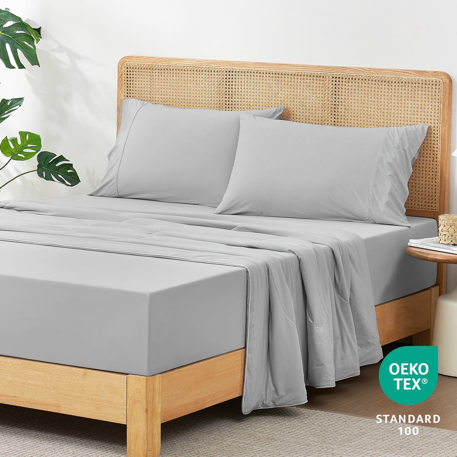 45-degree bedroom view with OEKO-TEX certified Snuggle Sac fitted sheet.#color_Light Grey