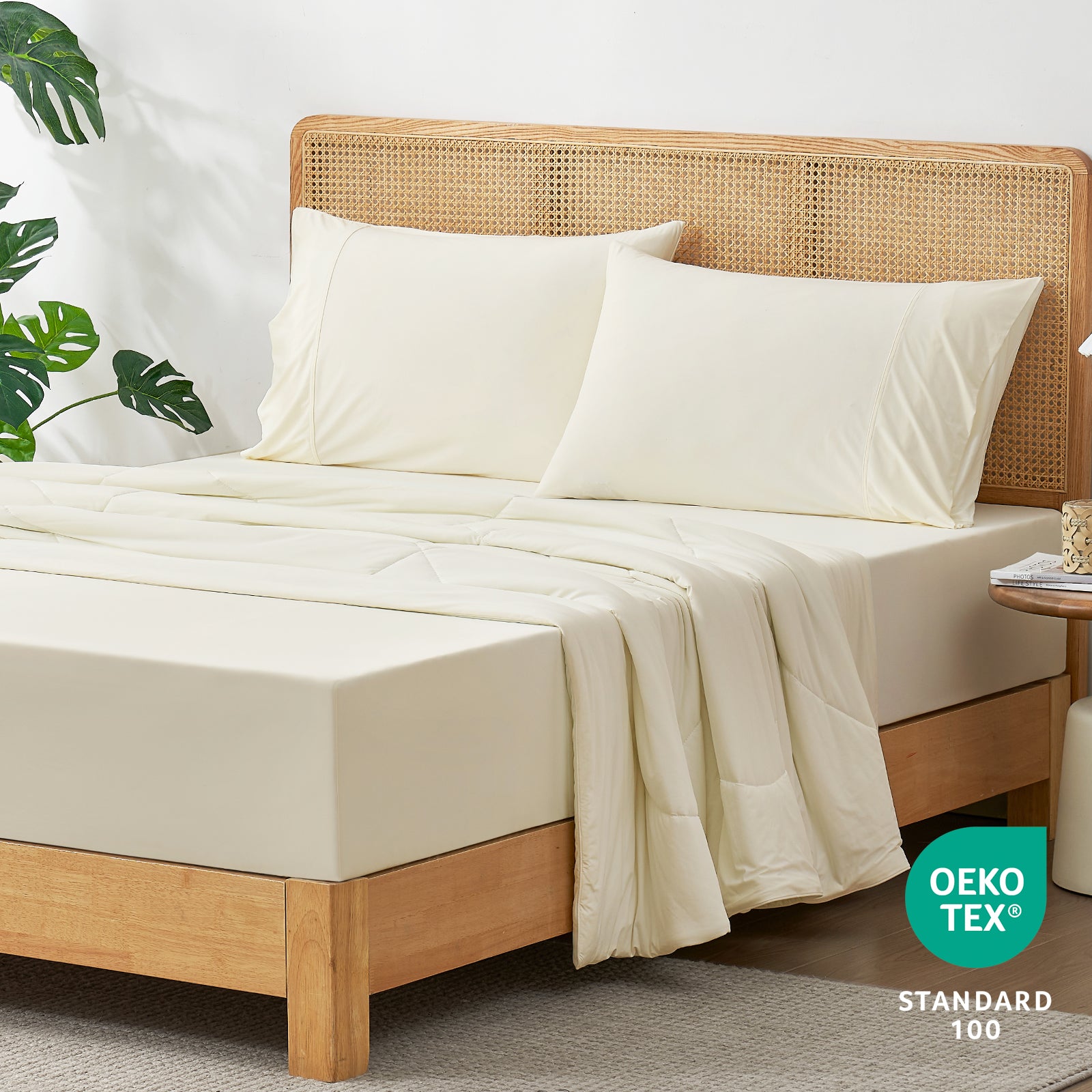 45-degree bedroom view with OEKO-TEX certified Snuggle Sac fitted sheet.#color_White