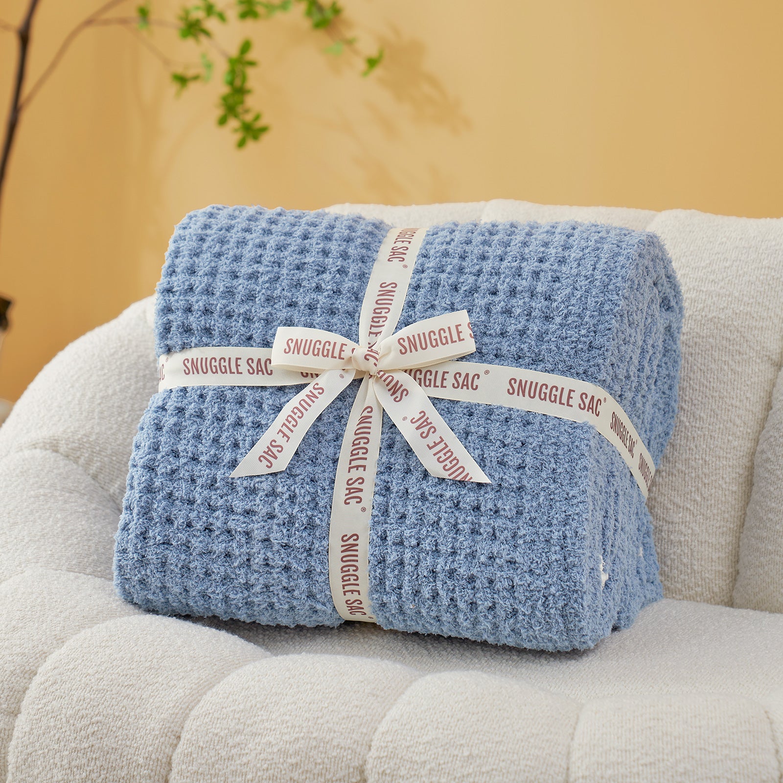 Soft Waffle Feather Yarn Knit Throw Blanket wrapped as a perfect gift with ribbon#Color_Blue