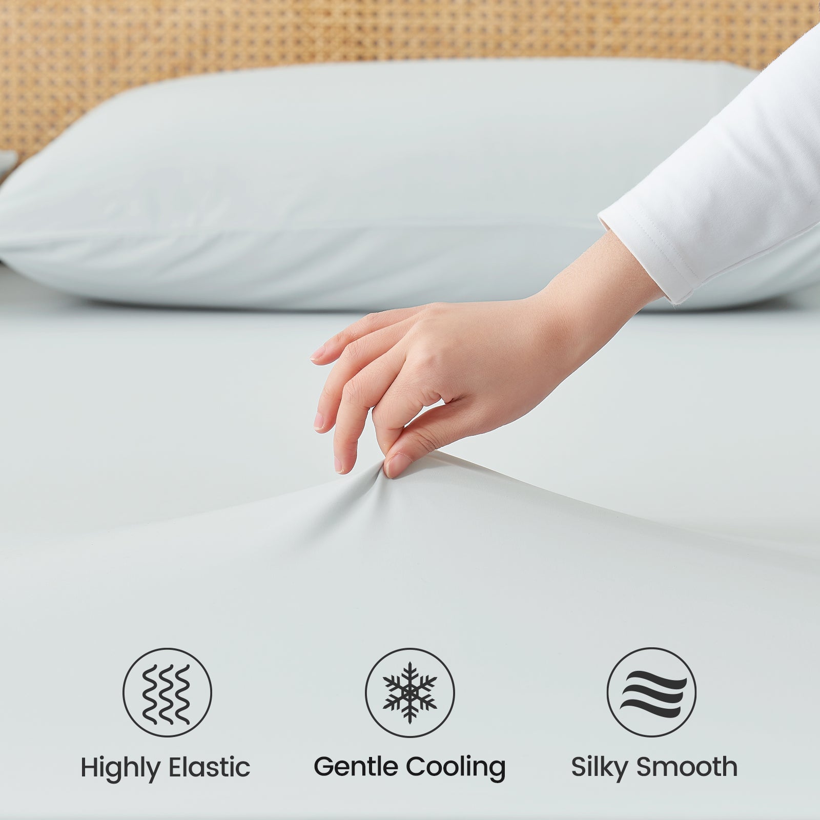 Close up of cooling fabric labeled 'Highly Elastic', 'Gentle Cooling', and 'Silky Smooth'.#color_Blue