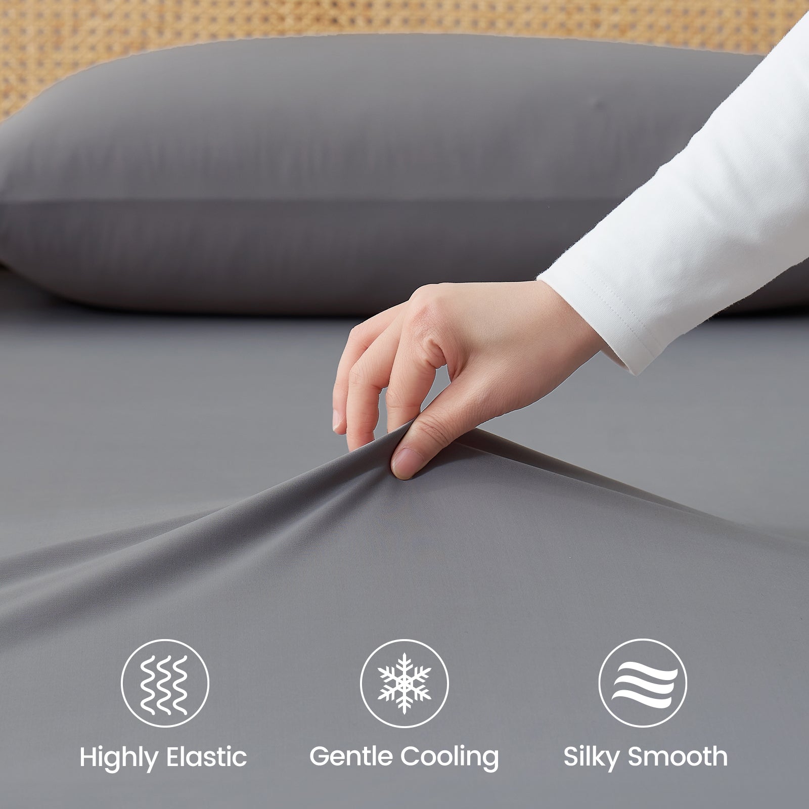Close up of cooling fabric labeled 'Highly Elastic', 'Gentle Cooling', and 'Silky Smooth'.#color_Dark Grey