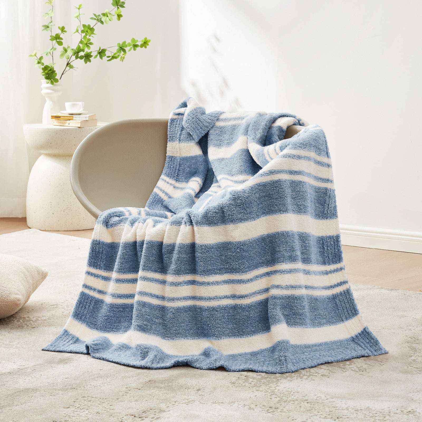 Striped Feather Yarn Knit Throw Blanket on a brown chair#Color_Blue