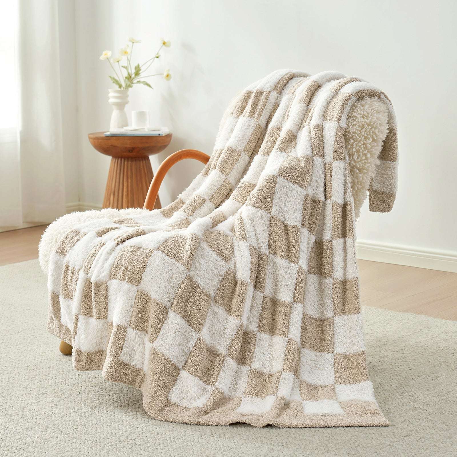 UltraCozy Checkered Feather Yarn Knit Throw Blanket on a beige chair#Color_Beige White