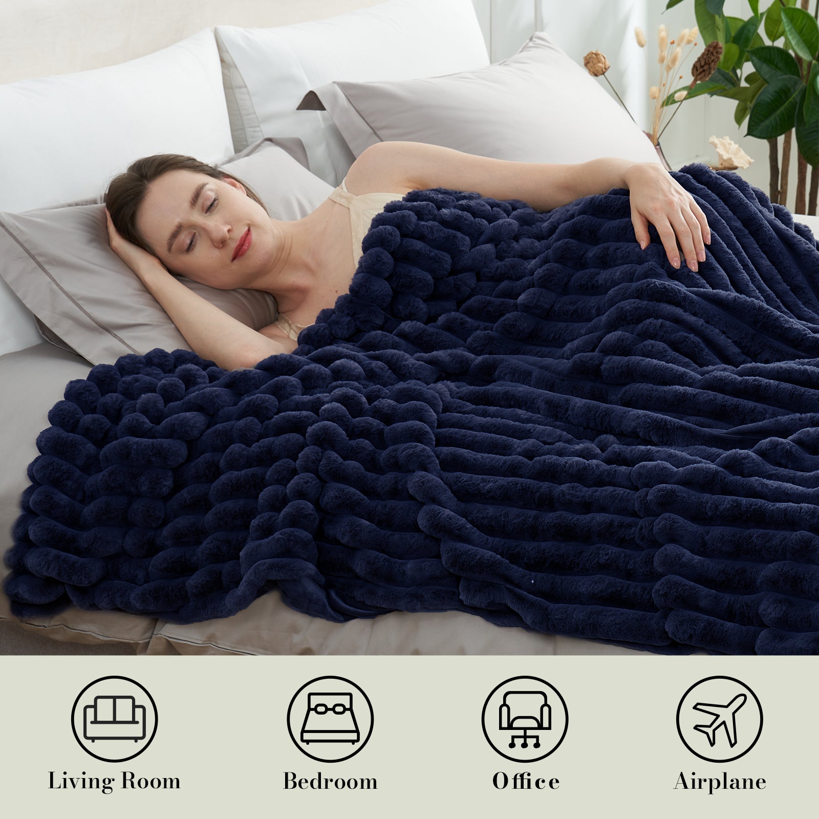 Woman sleeping under a striped faux fur throw blanket in Navy Blue for soft and comfortable warmth #color_Navy Blue