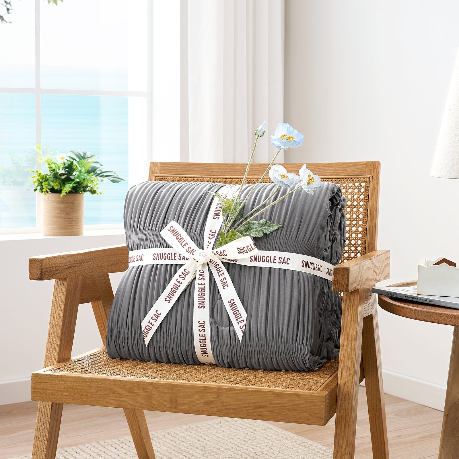 Folded Snuggle Sac dark grey comforter with white ribbon,perfect as gift.#color_Dark Grey