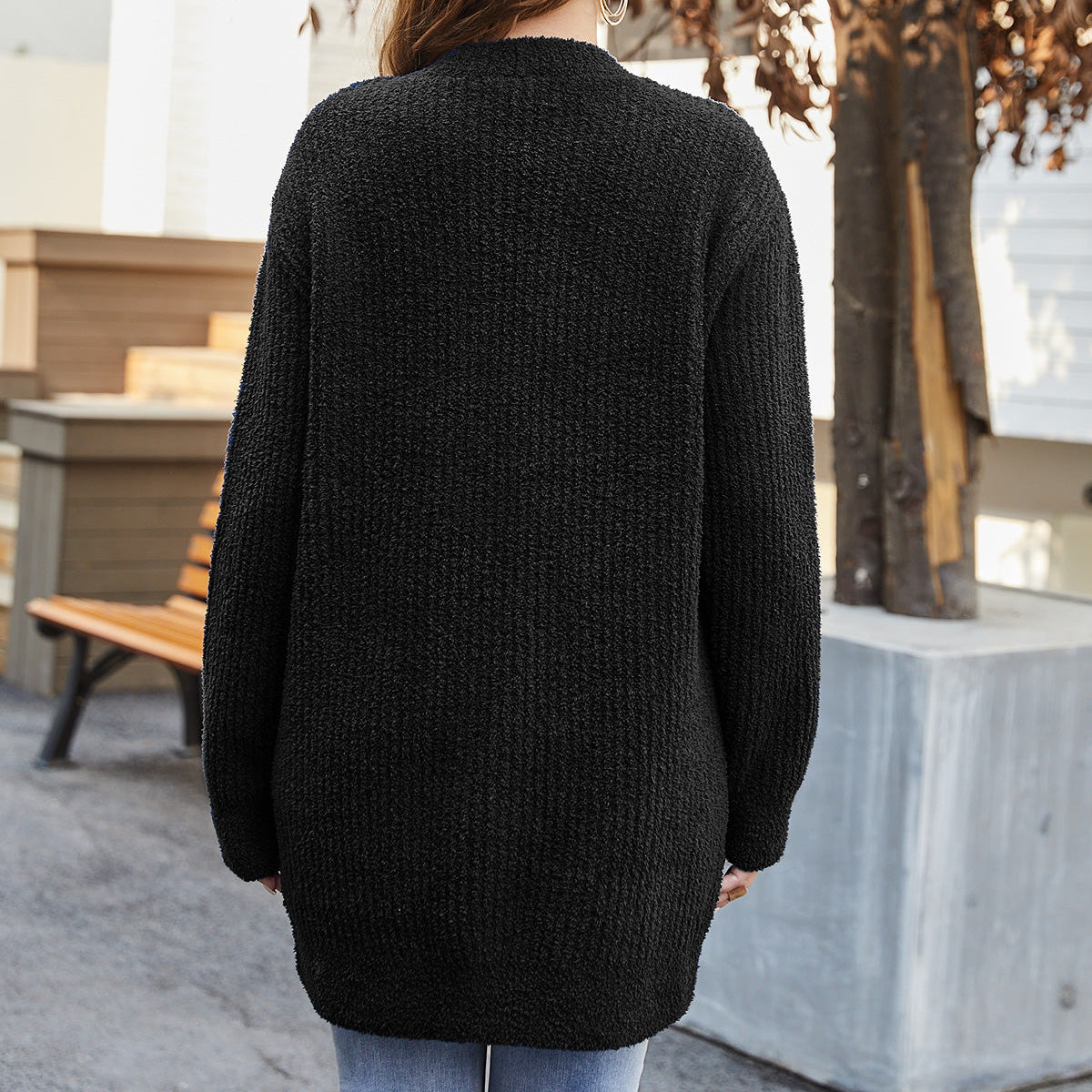 Back view of women cardigan sweater with pocket in Black, showcasing relaxed fit and soft knit texture #color_Black