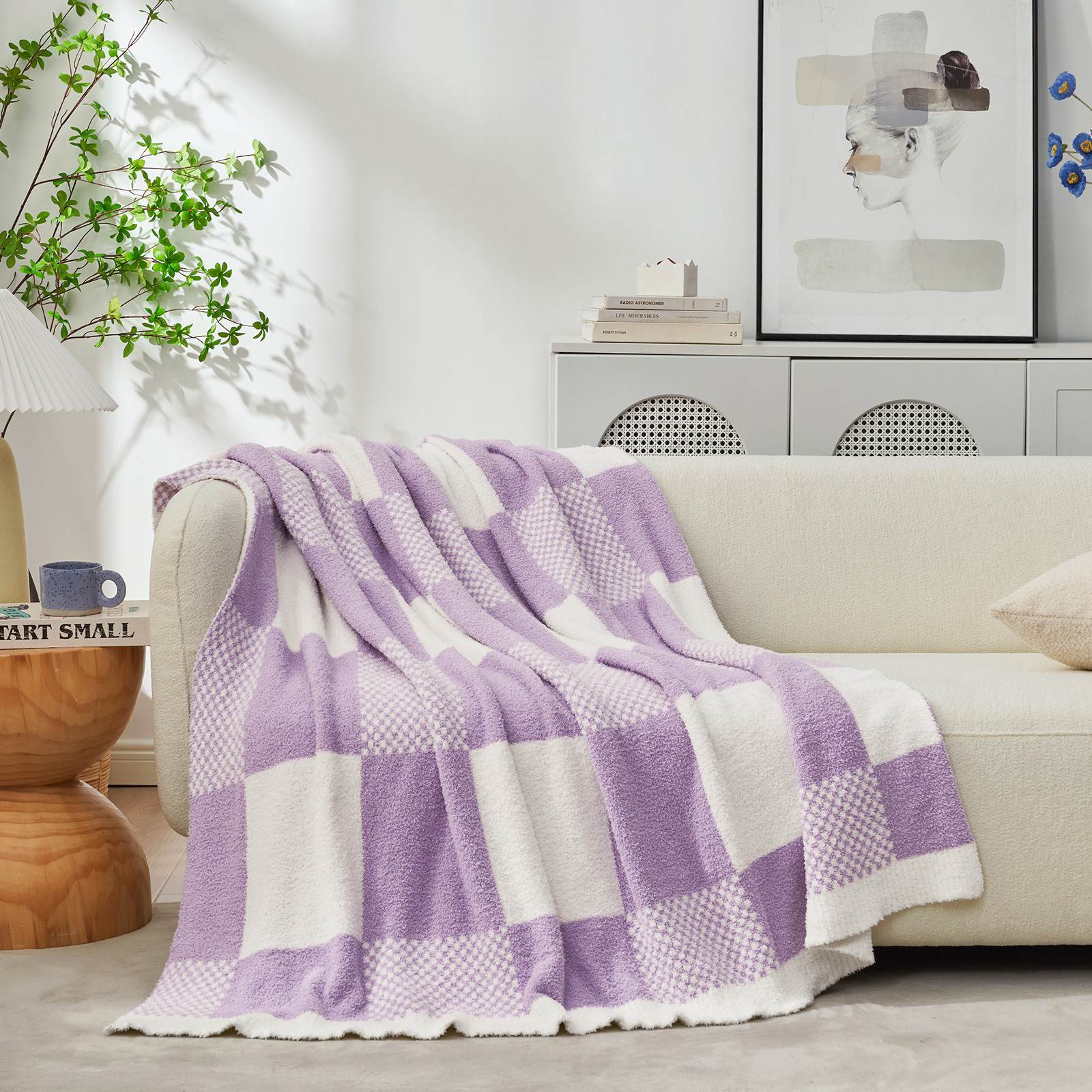 Snuggle Sac Checkered Feather Yarn Knit Throw Blanket on the couch with furnitures behind#color_Lilac