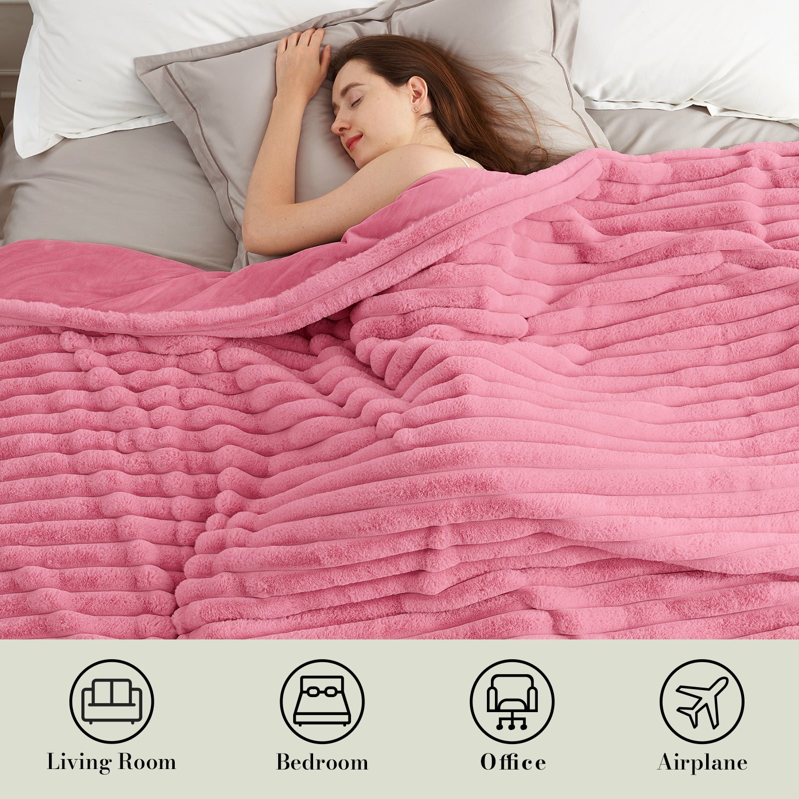 Woman sleeping under a striped faux fur throw blanket in Pink for soft and comfortable warmth #color_Pink