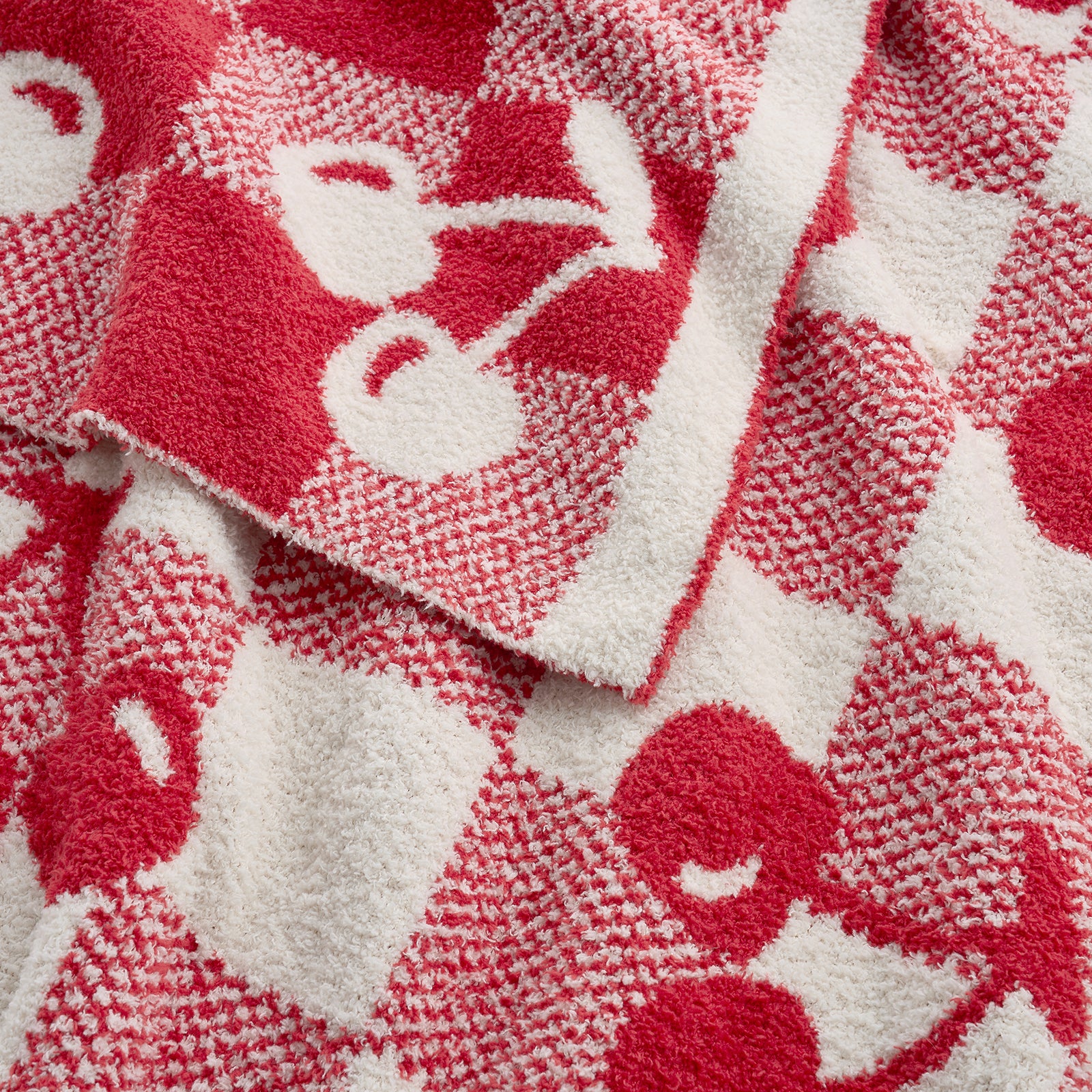 Close up of  Snuggle Sacs Red Cherry Feather Yarn Knit Throw Blanket#color_Red_Cherry