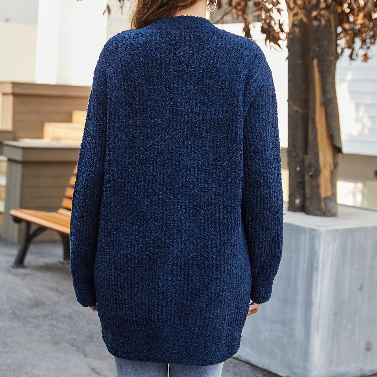 Back view of women cardigan sweater with pocket in Navy Blue, showcasing relaxed fit and soft knit texture #color_Navy Blue