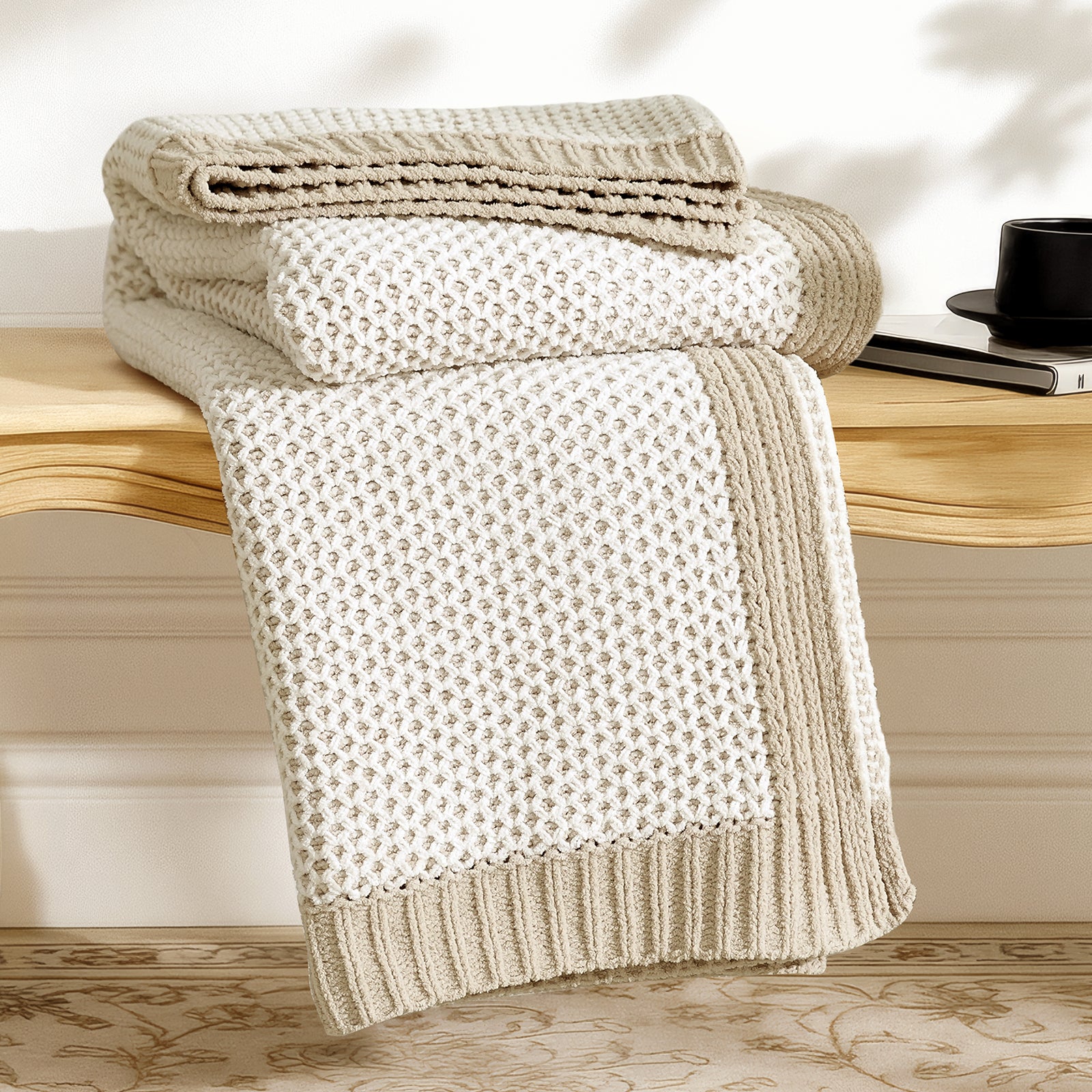 Snuggle Sac two tone honeycomb chenille knit throw blanket in Khaki and White neatly folded on a wooden table showcasing texture #color_Khaki