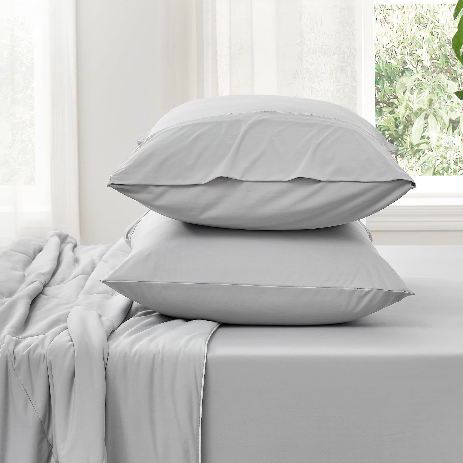 Side view of cooling fitted sheet and  pillowcase set#color_Light Grey