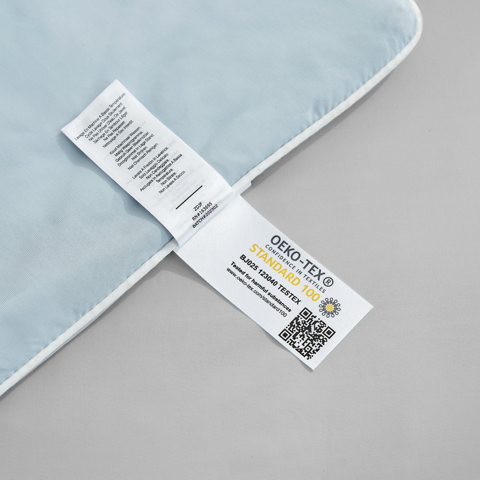 Close up of OEKO-TEX certified cooling fabric#color_Grey/Blue