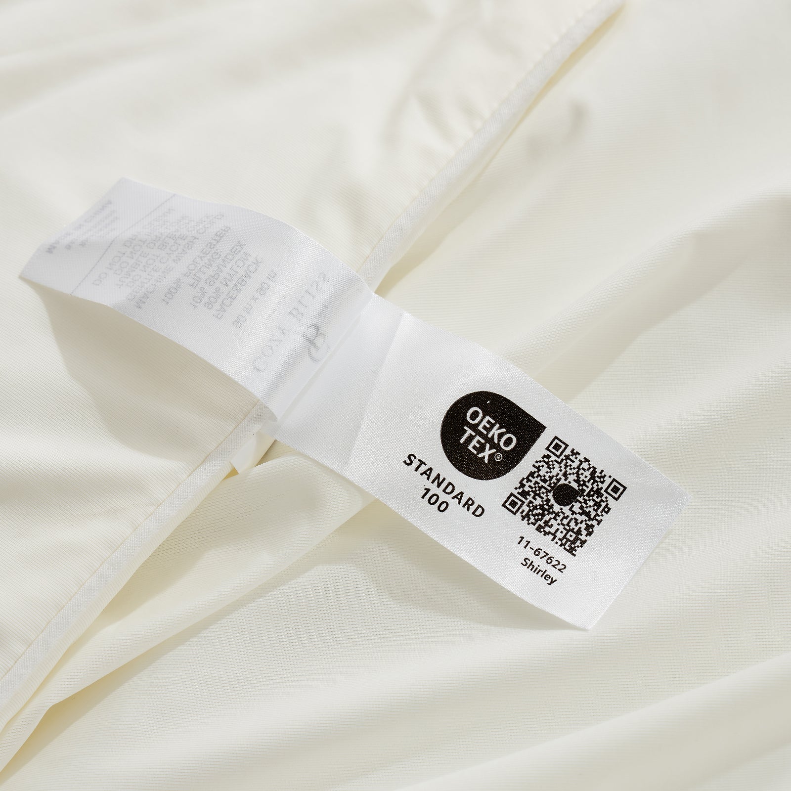 Close up of OEKO-TEX certified cooling fabric#color_Cream White