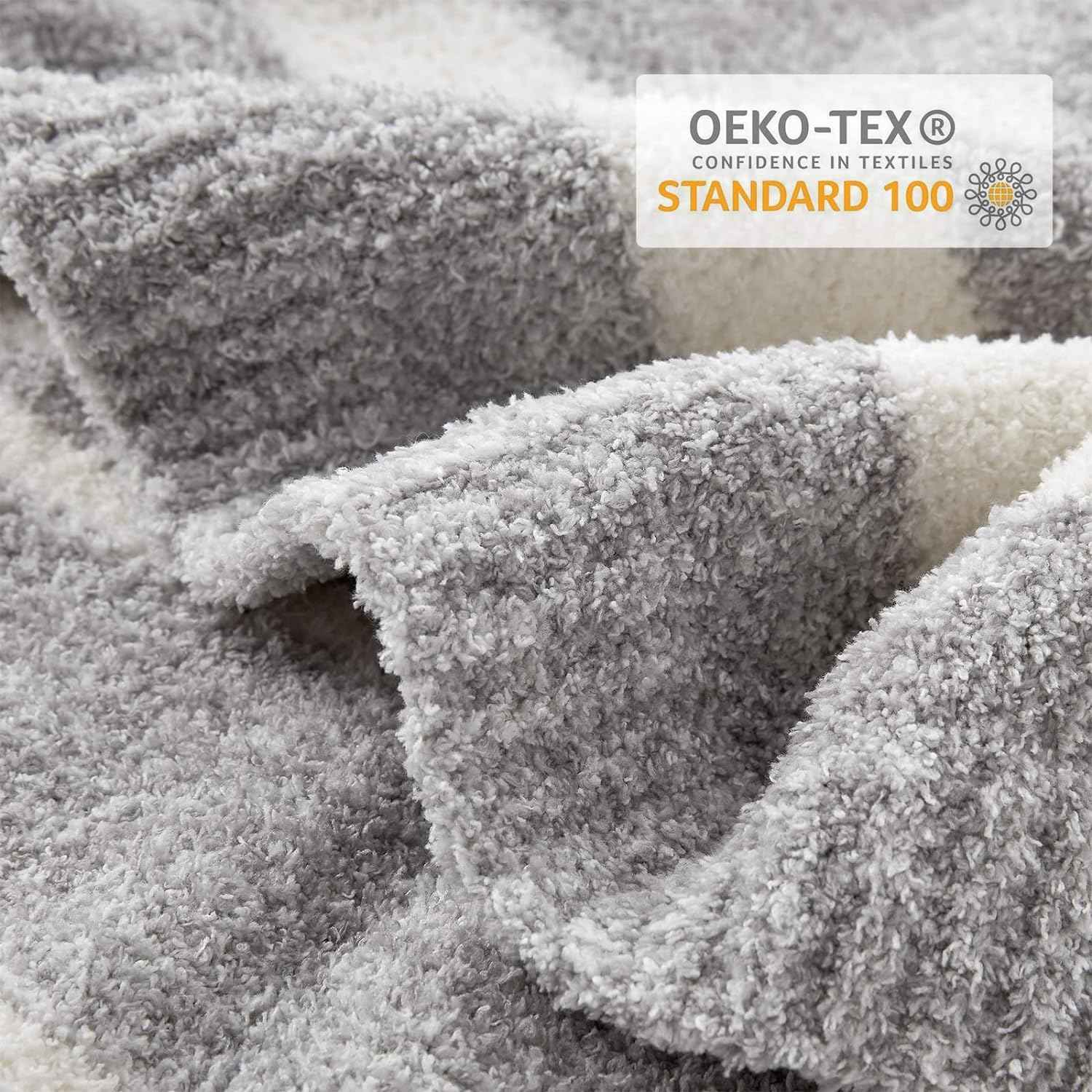 Close up of Striped Feather Yarn Knit Throw Blanket showing OEKO-TEX Certificate#Color_Grey